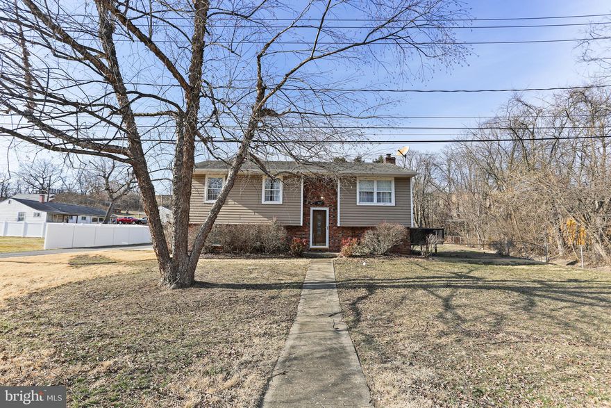 You’ve GOT to come see this home!!! 5 – count ‘em - FIVE BEDROOMS!!! The upper level PRIMARY BEDROOM with CATHEDRAL CEILINGS is enormous and it’s bathroom is incredible!!! It’s got a HEATED FLOOR and natural light flowing in from the overhead SUN TUNNELS! Laundry is on main level with the bedrooms (when do you see that in a home built in 1980!?!). It also has a completely finished lower level with a full bath and kitchenette that brings RENTAL potential! And then there’s the HUGE GARAGE!!! TWO 12 foot wide bay doors, high ceilings, and SPACE for your cars, workbench, tools, and toys!
The home was remodeled in 2008, including the Addition (fully permitted!) that added the spectacular primary suite, plus 5th bedroom, and spacious garage. Nearly everything in the home is 2008 OR NEWER, including the roof, siding, and multi-level deck with a HOT TUB (2021) that conveys with the house! HVAC, stainless kitchen appliances, and washer/dryer are all newer. Even the main sewer drain pipe from the home was replaced last year! The owners have spent more than $200k on additions and upgrades for this great home – come make it YOURS!
The home features a large fenced yard with a nice shed. It’s close to 695, 97, and Rt. 2 for easy access to Baltimore, BWI and surrounding areas, but tucked away in a sweet private neighborhood removed from the main commerce areas of Glen Burnie. This home is a MUST SEE!