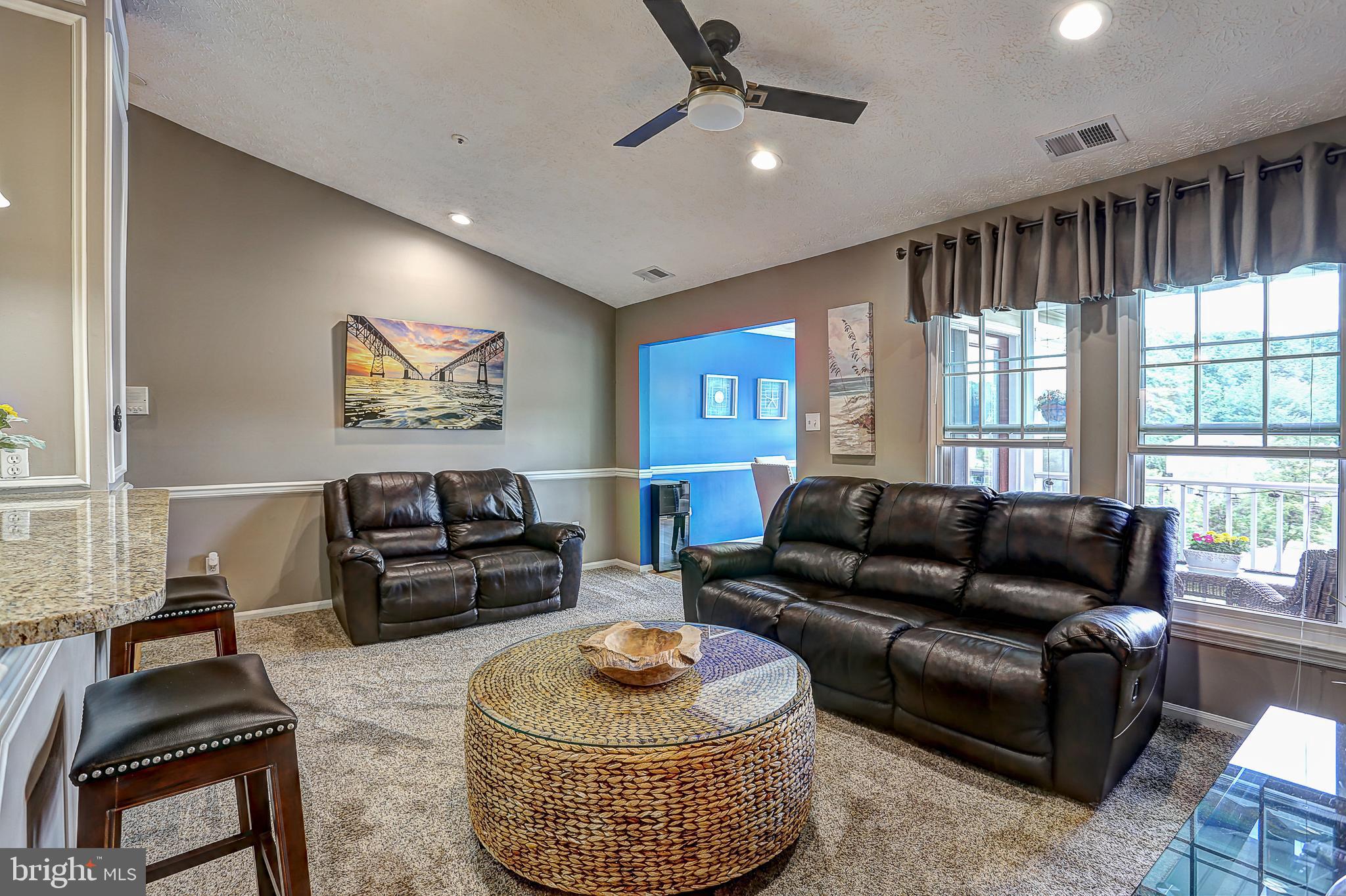 THIS 3RD FLOOR CONDO IS READY FOR THE PICKIEST BUYER WITH TOP OF THE LINE UPGRADES THROUGHOUT. YOUR EYES WILL IMMEDIATELY BE DRAWN TO THE VAULTED CEILINGS, NATURAL SUNLIGHT THROUGHOUT, RECESSED LIGHTING WHICH IS RARELY SEEN IN THIS COMMUNITY, CROWN & CHAIR RAIL WOODWORK THROUGHOUT AND DESIGNER PAINT COLORS. THE DINING ROOM IS THE PERFECT SETTING FOR DINNER PARTIES WHICH LEADS OUT TO A WONDERFUL AND PRIVATE BALCONY THAT HAS BEEN WELL MAINTAINED. THE KITCHEN FEATURES GRANITE COUNTER TOPS, STAINLESS STEEL APPLIANCES, BEAUTIFUL CABINETRY AND AN ISLAND PERFECT FOR 4 WITH PENDANT LIGHTING. THE SUPERIOR QUALITY "FRIEZ/SHAG" CARPETING FEATURED IN THE MAIN LIVING AREA IS LUXURIOUS, BERBER IN THE BEDROOMS. ENGINEERED HARDWOOD IN THE HALLWAY LEADS YOU TO THE 13' X 19' LUXURIOUS MASTER SUITE WITH TWO SPACIOUS CLOSETS. THE SECOND BEDROOM IS 10' X 11'. NEWER RENOVATIONS INCLUDE HVAC, 8 - "FUSION" DOUBLE HUNG WINDOWS RATED HIGH IN ENERGY EFFICIENCY. ALL OF THE "SMART" TELEVISIONS CONVEY. THIS COMMUNITY IS GETTING A TOTAL NEW LOOK WITH HARDY BOARD SIDING WHICH WILL INCREASE THE PROPERTY VALUES $10K *RENOVATIONS HAVE ALREADY BEGUN. MUST SEE!