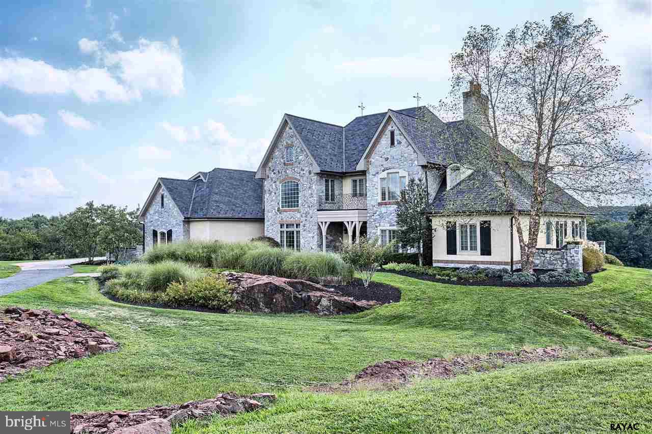 This stunning custom built home offers over 7,000 sq.ft. of luxurious living that can cater to all your needs and sits on almost an acre of land. If you are of a exquisite taste, you will appreciate all that this spectacular has to offer. All BRs with private BA, infinity pool overlooking a beautiful pond and # 7 hole at the award winning links Of Gettysburg. Take a private tour to appreciate.
