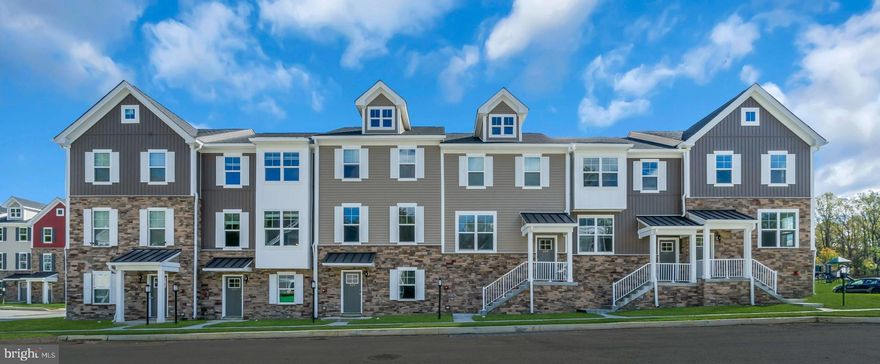 Welcome to Mi-Place at Downingtown, where this spacious three-bedroom, two-and-a-half bath townhome offers upscale living with an attached two-car garage and thoughtfully designed interior space. This home features an open-concept layout with luxury vinyl plank flooring in the main living areas, generous natural light, spacious closets, and a private patio or balcony. The modern kitchen is finished with sleek cabinetry including 42-inch upper cabinets, quartz countertops, stainless steel appliances, a breakfast bar, and designer chrome fixtures, making it ideal for both everyday living and entertaining. Upstairs bedrooms are comfortably carpeted, while the townhome includes a finished lower-level flex room, perfect for a home office, gym, or additional living space. Additional features include a full-size washer and electric dryer, smart locks, smart thermostat, electric heat, central air conditioning, and an energy-efficient 50-gallon electric water heater. Residents enjoy access to resort-style amenities including a clubhouse, fitness center, pool with outdoor lounge area, kiddie pool, pickleball court, half basketball court, fire pits, BBQ areas, walking paths, dog park, tot lot, open recreation areas, and EV charging stations, all with no amenity fee. Cats and dogs are welcome with applicable weight limits, fees, and monthly pet rent. Conveniently located near major routes, shopping, dining, and employment centers in Downingtown, Exton, Malvern, West Chester, and King of Prussia, this townhome offers luxury, space, and convenience in a premier community.