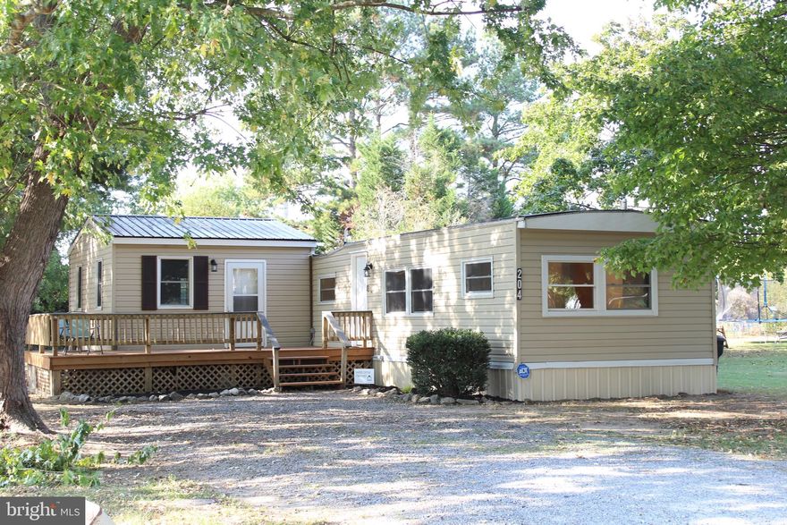 Motivated Sellers – No Ground Rent or Land Lease!! This beautifully updated 3-bedroom, 1.5-bathroom mobile home with a bonus room addition is located in the heart of Greensboro, directly across from Ober Park! It features numerous upgrades, including fresh paint, new lighting, new countertops, new duct work, new insulation, new water vapor barrier, and new flooring throughout. The kitchen is equipped with stainless steel appliances. Enjoy the large deck and spacious lot for outdoor living. Additionally, there is a shed in the back of the property with power, providing extra storage or workspace. This move-in-ready home offers plenty of space and charm in a prime location! **Sellers are highly motivated and ready to make a deal. Flexible financing options, including owner financing, are available. Don’t miss your chance to own this gem—schedule your showing today!