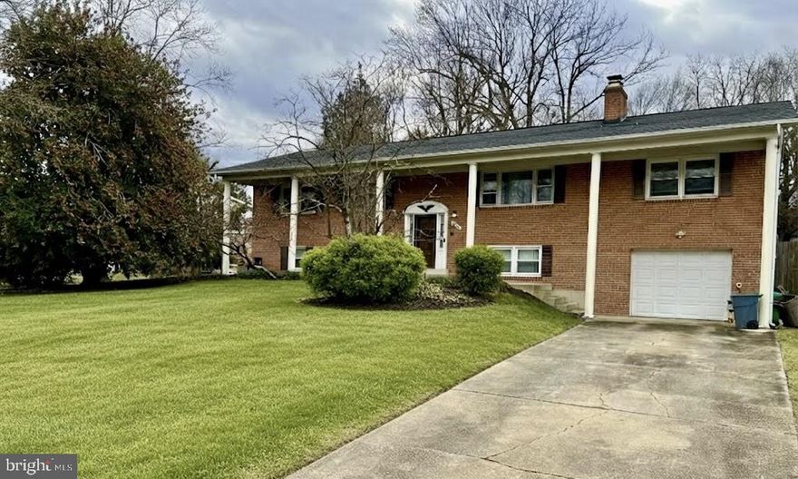 ***Interior photos coming soon***

Welcome to this beautifully crafted estate-style dream home, tucked away in a prestigious neighborhood on a half-acre lot. This impressive all-brick residence features grand columns, fresh landscaping, and a one-car garage with a split-foyer layout. Inside, you’ll find five spacious bedrooms and three full bathrooms designed for comfort and functionality.

The home is scheduled to undergo extensive renovations beginning February 10th, including a full kitchen upgrade, fresh paint throughout, new interior doors, refinishing of genuine hardwood floors, complete bathroom upgrades, and the transition of basement paneling to modern drywall.
The chef’s kitchen will be fully updated and designed for entertaining, while the home also offers a formal dining room and a separate family room with a wood-burning fireplace, creating warm and inviting living spaces. The fully finished basement includes two of the five bedrooms, a full bathroom, and a built-in bar with sink—ideal for guests or recreation.

Step outside to a fully fenced backyard featuring a full-size deck, in-ground pool, and a brand-new gazebo—perfect for outdoor entertaining. Major updates including windows, roof, exterior doors, HVAC, and hot water heater are all less than 10 years old.

Conveniently located with an easy commute to Washington, DC, Southern Maryland, and Virginia, and just minutes from restaurants, nightlife, and shopping. The seller is also offering closing cost assistance, making this exceptional estate home an even greater opportunity. Don’t miss your chance to make it yours.