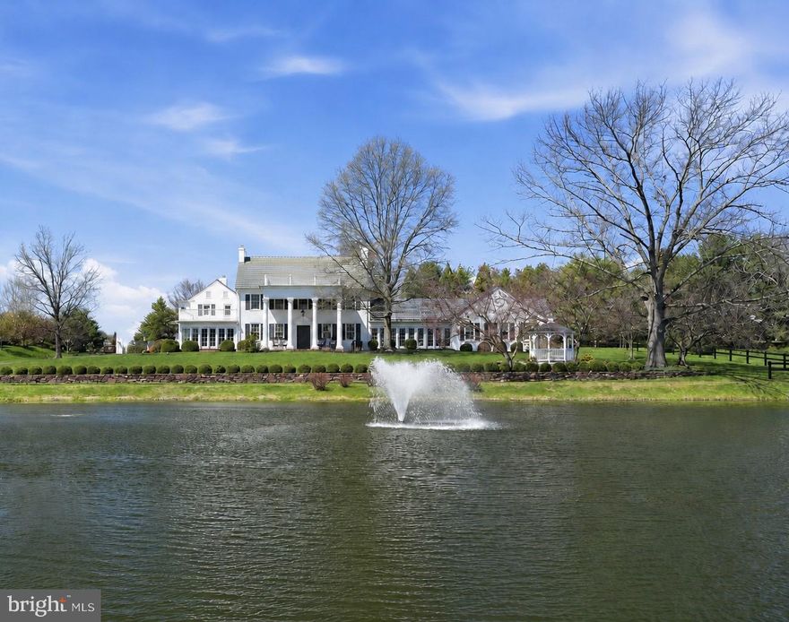 RITTENHOUSE ESTATE - 1775 -  HISTORIC ELEGANCE MEETS MODERN LUXURY- INCLUDED IS A
1,450 SQ FT - 2BR/1.5BATH ADDITION FOR A TOTAL OF 7 BR's/4.5 BATHS.  In the rarest of occasions, a home is so breathtakingly exceptional in every way that it evokes emotion in your heart. This is such a home. Historically significant and remarkably renovated by 11 generations. Set on the grounds of a 1775 hand-dug well, topped with tempered glass for viewing ancestral craftsmanship. This rare feature is surrounded by a peaceful courtyard w/magnificent planting.  The outdoor setting is a private retreat with lush gardens, manicured boxwoods, glorious gazebo, and sparkling pond with fountain creating a serene resort-like setting.  Multiple garages, including workshops, provide exceptional storage and functionality.  Inside, timeless craftsmanship meets high-end design.  A quartet of Williamsburg-inspired columns highlight the beauty of the expansive front porch and set the stage.  Inspired by the drama of hand-kerfed walls that match deep window sills found throughout the home, the  NARI  award-winning Chef's Kitchen by Harth Builders showcases abundant white custom soft-close maple cabinets glazed in a gray finish that harmonize with the center island w/mounted microwave, expansive quartz tops, and neighboring wet bar w/Sub-zero ice-maker. Signature red-knob Wolf  six-burner range with double ovens and grill, Sub-zero refrigeration, three pantries, and  premium appliances throughout. Natural light bathes the kitchen’s adjoining sunroom, a dining spot of pure perfection. Wrapped in windows, pleasure surrounds you inside and out you might never want to leave this gathering spot of the home.  Windows at every turn and curve take full advantage of stunning views and provide unlimited light throughout the home. In addition to the sunroom dining area there is an exceptionally large formal dining and living space in the center of the home - perfect for holiday dinners and social entertaining events. You can't help but notice the uniquely beautiful antique Long-Leaf pine 10' wide floorboards, the unusual 12" cord-around baseboards, stunning chair rail and crown molding.  Walls are 24" thick.   All these features add to the property’s elegance and unique charm. A spacious family room next to the kitchen w/ gas fp provides warmth and comfort  and plenty of space for relaxing and gathering.  The first floor’s flexible floor plan also includes two additional rooms (ideal for bedroom, offices, or playroom), full bath and convenient laundry/mud room. The drama continues on the second floor. The owners’ suite includes a dressing room and en-suite bath   The beautiful large bay window in the owners’ BR floods light in the morning to start your day.  Enjoy scenic views and listen to the waterfront sounds of the pond fountain while sitting on the private porch of the BR.  Three other large bedrooms are accented with curved walls and deep comfortable window seats, yet one more way to take in the incredible views - every room has multiple windows for panoramic views! The walk-up third floor attic allows for plenty of storage space. A major highlight is the mirror- image, 2 BR/1.5 bath 1450 sq.ft. Addition with private entrance which can opt as inlaw suite, room for older children, private quarters  Features include a living/dining area, sunroom, full kitchen w/ island, quartz counters, two pantries, continuing longleaf pine wood floors, a laundry, expansive heated garage, and surprisingly copious storage throughout. The main BR and bath include the latest style bathtub, double sink, wainscoting, and threshold-free shower. As in the estate home, views are endless. Each step you take unveils an exquisite architectural touch, a piece of beautifully preserved history, and rooms filled with special and unique features. It's a home you simply must see - You  won' t want to leave!
PROOF OF FUNDS ARE REQUIRED IN ADVANCE OF TOURING. FIRST TIME SHOWN -5/17/26 -12 - 3