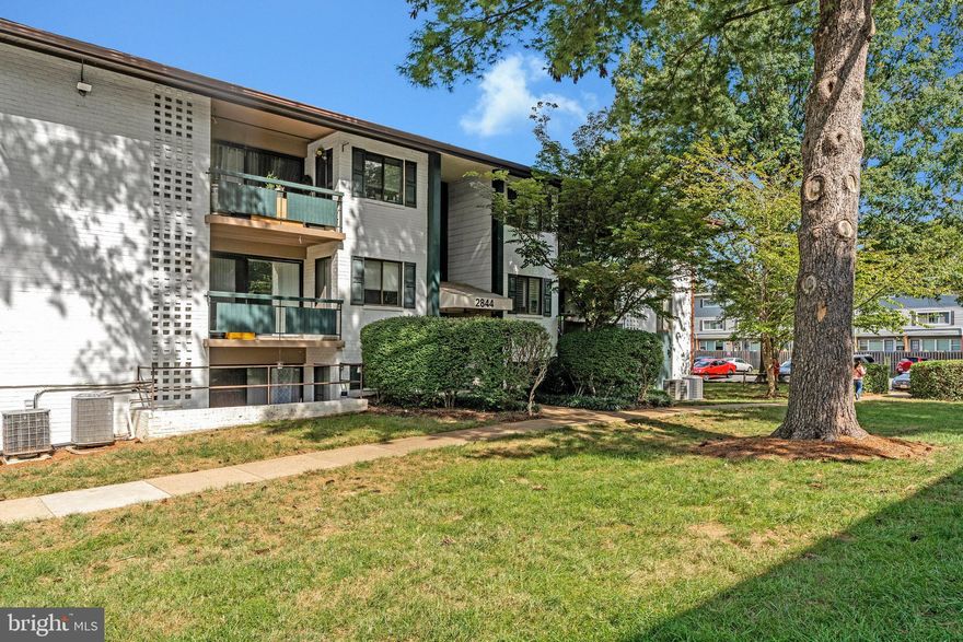 Charming One-Bedroom unit featuring a private fenced-in backyard with a Covered Patio- perfect for relaxing, entertaining and gardening.  Inside you'll find hardwood flooring throughout the living area, a spacious Living Room with a Triple-Slider overlooking the backyard, an Updated Kitchen with Tile Flooring, Maple Cabinets with undermount lighting, Granite countertop with tiled backsplash, Stainless Steel appliance, Gas cooking and a Pantry. The Separate Dining Room overlooking the back yard can also be used as a home office.  The Bedroom features Two Closets - the large Walk-In closet has custom Built-Ins/drawers. Updated Bathroom with Ceramic Flooring.  Linen closet, Full sized Front Load Washer and Dryer. Updated interior doors, newer Heat Pump, Microwave & Dishwasher.  Storage Room with Cage along with Bike Storage. Condo fee includes water, sewer & trash & Outdoor Pool. Plenty of parking for you and your guests. Located just minutes from the Mosaic Districts restaurants and shops, major routes and a bus stop just steps away.