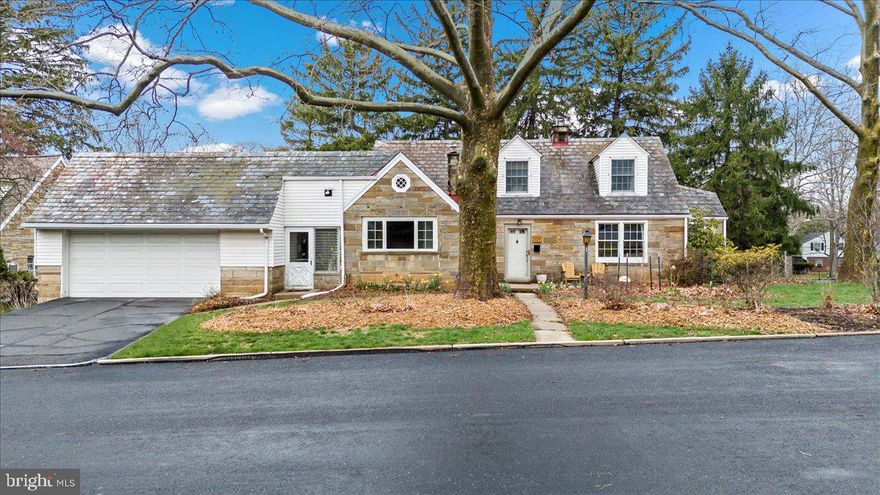 Open House Canceled**MULTIPLE OFFERS RECEIVED**H&B DUE APRIL 18 @ 5 PM**This beautifully updated Cape Cod home blends timeless character with modern comfort. The fully renovated custom kitchen is a true showstopper, featuring quartz countertops, custom cabinetry, soft brass hardware, and 7+ ft center island with seating. Built-in speakers in the kitchen and adjacent dining area create the perfect backdrop for entertaining, with sliding glass doors leading directly to the backyard patio. The spacious living room is anchored by an impressive, full-height original stone fireplace, flanked by built-in shelving and a sunny window nook — the perfect spot for reading or relaxing. A separate office or den offers flexible living space and direct access to the patio. Upstairs, you'll find 2 large bedrooms featuring hardwood floors, charming dormer windows, and generous closets. A third bedroom option is available on the main level for added versatility. The 2 full bathrooms combine vintage charm with thoughtful updates, offering stylish finishes and a clean, modern feel. The versatile laundry/mudroom features cabinetry, recessed lighting, and plenty of space for a home gym or hobby area. Outside, a deep backyard framed by mature trees provides privacy and tranquility, brand-new raised garden beds for planting, and a patio ideal for enjoying peaceful evenings. Located in the sought-after East Penn School District on a quiet, tree-lined street just minutes from shops, restaurants, and parks — this stunning Emmaus gem is not to be missed!