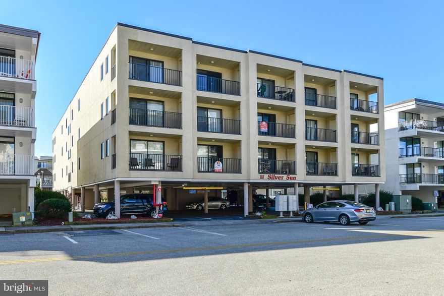 Ocean block 2nd floor corner unit beauty with a pool! This 2BR/2BA condo has been upgraded throughout and priced to sell. The kitchen has granite countertops, upgraded cabinets, upgraded  appliances and plenty of cabinet space to delight the cook in your family. The kitchen opens to the dining and family room areas for entertaining family and friends. There is a large deck off the family room with a peek of the ocean. The master bedroom is spacious and has its own private upgraded bath. The 2nd bedroom is large as well. The condo has a light and airy feel and is being sold fully furnished and ready for your immediate enjoyment. The building is well maintained with low condo fees and is only steps from the ocean. There is an outside storage closet, plenty of parking and a large outside pool for summer fun. Come take a look today before it is SOLD!