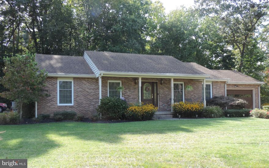 BEAUTIFUL RANCHER SITUATED ON 2.83 ACRES!  This 3 bedroom, 2 full bath home is immaculate and move in ready!  Living room, kitchen/dining combination, four season room that overlooks backyard and patio.  Sellers have made numerous updates to include bamboo flooring, some doors and window have been replaced, both  bathrooms have been updated and kitchen has been renovated.  Some appliances have been replaced.   Unfinished basement with exit to the backyard.  2 car garage.  OPEN HOUSE  CANCELLED