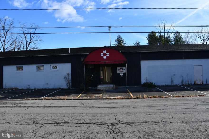 388 Chestnut Street is a standalone commercial office building of approximately 8,750 square feet situated on a 0.62-acre lot, offering substantial scale and flexibility for a wide range of professional, administrative, and operations-based users.
The interior features a functional mix of: