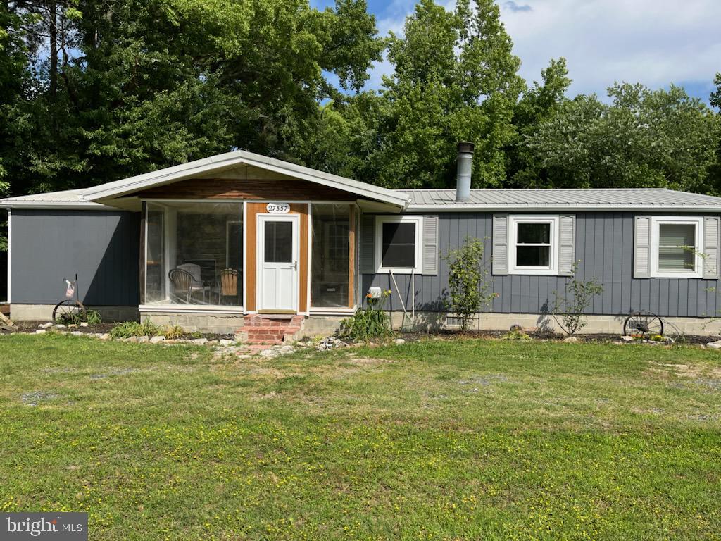 This 3-bedroom 2-bathroom home sits on just under an acre of land in the serene area known as Fairmount. Enjoy the peace of nature and room for your hobbies in the large yard with several options for storage and creative use. You'll be impressed by the home's maximum use of space upon entering. The semi-open floor plan makes the home feel spacious while still providing definition to each room. The large kitchen, with granite countertops and plenty of cabinetry, will satisfy all your needs. The primary bedroom features a large closet, and the primary bathroom is equipped with a jacuzzi tub and shower, making you feel right at home. Many updates and improvements include siding, a carport with an added garage door, flooring, kitchen, and HVAC. Located just 3 minutes to the Fairmount Wildlife Management Area. 7 minutes from the famous Goose Creek Pit and Pub and boat launch, and15 minutes to Princess Anne.