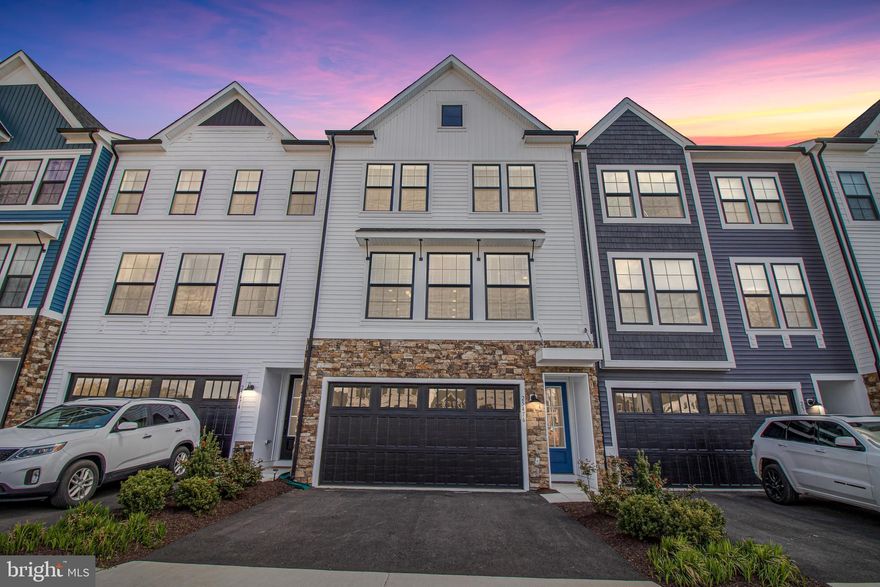 Gorgeous ONE YEAR OLD open Farmhouse style custom built townhouse within walking distance to the NEW PVI High School. 3 finished levels with 2 car built in garage.  High end flooring throughout.  Generation X suite on the lower level with full bath and 2 walk in closets.  Can be used as bedroom #4, family room, exercise space or home office.  The main level is open and feels huge.  The family room area has a gas FP and opens with french doors onto a beautiful new deck.  The kitchen has high end cabinets with slow close drawers, stainless steel appliances, backsplash and granite countertops.  There is an abundant amount of countertops and the large island fits 5-6 barstools.  The dining room fits a large table with room for a home office or desk.  There is also a large walk in pantry and powder room on the main level.  Upstairs, the master suite has a $5000 custom closet, and en-suite bathroom with oversized shower.  There are 2 additional bedrooms, another full bath and the washer and dryer upstairs.