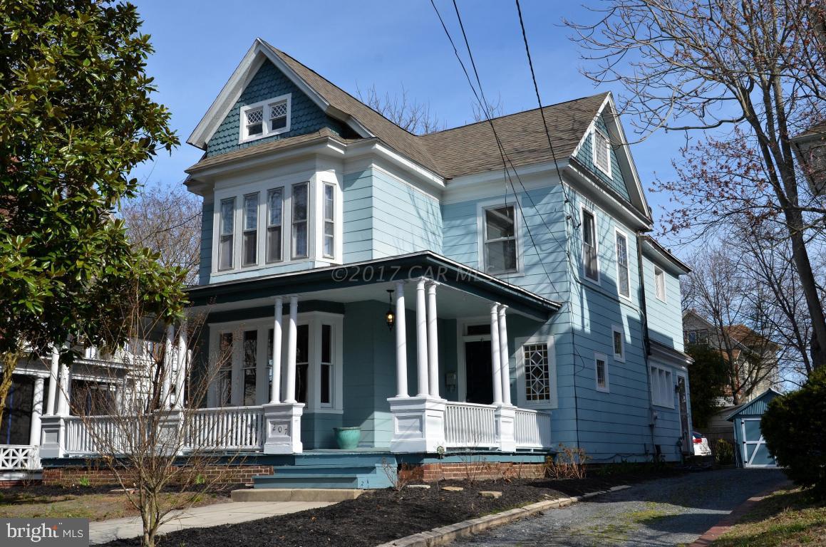 This charming 1814 sq. ft. home has 3 bedrooms and 2 full baths. One bathroom features the original claw foot tub, while the other has a whirl pool tub. The first floor has crown molding, refinished hardwood floors, and built in shelving. The appliances in the large eat-in kitchen are only 1 1/2 years old. Beautiful stained glass windows lead you up the stairs to the second floor where you'll find 3 large bedrooms and newer carpeting throughout. The entire house has fresh paint. Relax on the wrap around front porch in the swing or maybe on the brick patio in the back yard. Off street parking with a shared driveway. About 5 minutes to SU and even closer to PRMC!Being sold as-is. Reasonable offers welcome.