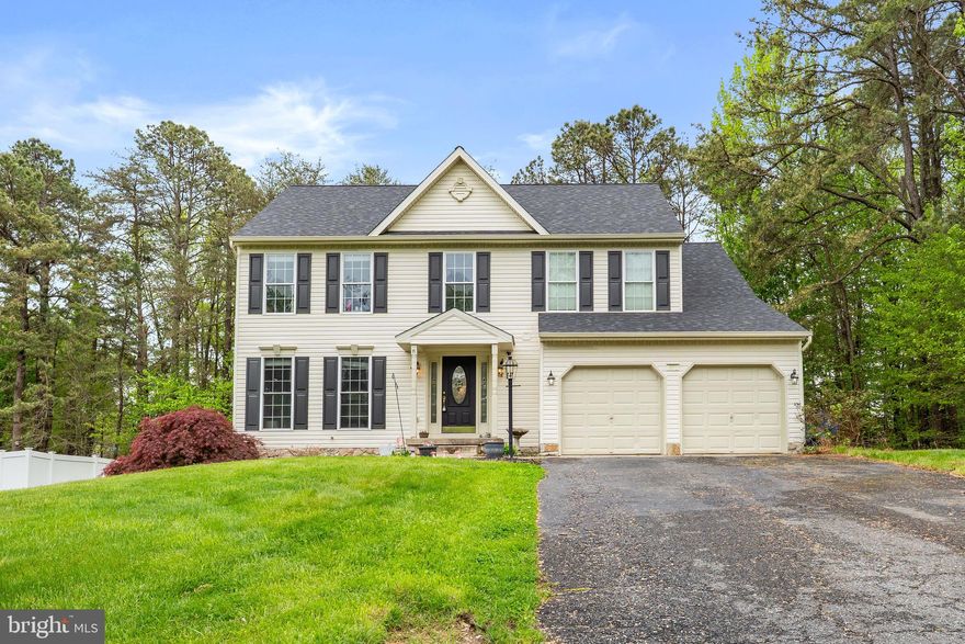 Tucked away at the end of a quiet road in a highly desirable community, this 4-bedroom, 2.5-bath Colonial offers the perfect blend of space, privacy, and versatility. The main level flows effortlessly, while the upper level features four spacious bedrooms, including a comfortable primary suite. One of the standout features of this home is the finished basement, thoughtfully designed to function as a private in-law suite or separate apartment. Complete with a kitchenette, living room, bedroom, laundry area, full bath and separate entrance it’s perfect for extended family, guests, or even potential rental income. Enjoy the convenience of a two-car garage and the added privacy at the end of the road. With its desirable location, flexible living options, and room to grow, this home checks all the boxes.  Schedule your private tour today!