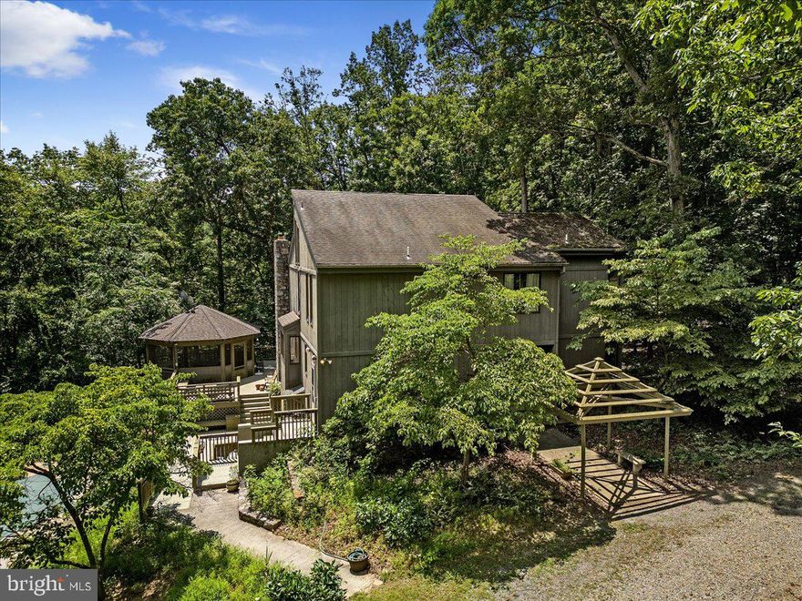 Welcome to an extraordinary property in Bluemont, VA, where luxury and nature blend seamlessly. This unique gem offers an array of exceptional features that are sure to captivate even the most discerning buyer. Situated on 30 breathtaking wooded acres with river access, this estate provides a tranquil retreat surrounded by the beauty of nature.

Step inside and be greeted by an open floor plan. The gourmet kitchen is a chef's dream, boasting high-end appliances, custom cabinetry, and ample counter space for culinary masterpieces. The center island is perfect for gathering with loved ones or enjoying a quick meal, while the adjacent dining area offers a sophisticated space for formal dinners.

The spacious living area is flooded with natural light, creating an inviting atmosphere for relaxation and entertainment. The soaring ceilings and fireplace add a touch of grandeur, making this the ideal spot to unwind with family and friends.

Step outside into your own private oasis. The expansive deck overlooks the lush greenery, providing a serene backdrop for outdoor gatherings and al fresco dining. The  pool offers a refreshing escape during the warmer months, allowing you to bask in the sun and embrace the joys of summer.

The property also features a guest house, providing an additional space for visitors, workshop or potential rental income. This separate dwelling offers privacy and is ready for your personal touches to complete. Cozy loft with kitchenette and private bath.

With 30 wooded acres at your disposal, you'll have plenty of room to explore and indulge in outdoor activities. Whether you're a nature enthusiast, an avid hiker, or simply seeking solitude, this property offers a true escape from the hustle and bustle of everyday life. And with river access, you can enjoy fishing, kayaking, or simply basking in the beauty of the water.

But the allure doesn't end there. This property comes with an additional Development Unit Right (DUR), allowing for future expansion or development opportunities. (Contact county for verification) Whether you envision building another home, a workshop, or even a barn, the possibilities are endless.

Located in Bluemont, VA, this property offers the best of both worlds - a serene and secluded setting that is still within close proximity to urban amenities. Enjoy easy access to charming local shops, restaurants, and wineries, creating the perfect balance between country living and modern convenience.

Don't miss out on this once-in-a-lifetime opportunity to own a truly exceptional property in Bluemont, VA. Embrace the beauty of nature, indulge in luxurious living, and create a lifetime of memories in this remarkable estate. Schedule your private showing today and prepare to be captivated by all that this property has to offer!

Broker makes no representation as to the accuracy or reliability of the information. The buyer is to verify information provided and related to the property that is material to a buyer’s decision to purchase the property. All documents and other information attached to this listing are provided as a courtesy and should be researched and verified by the buyer agent.