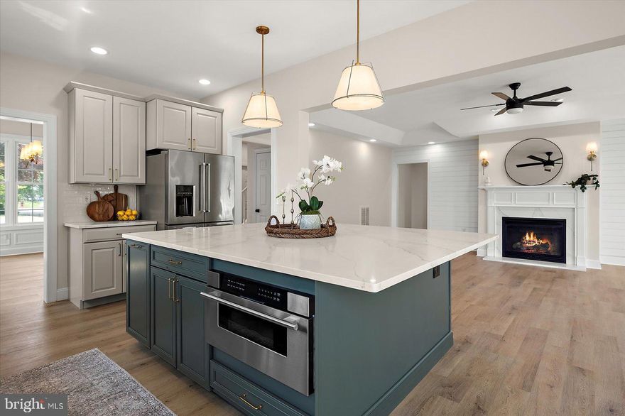 Priced to sell – under $152 a square foot! Bring all offers!
Built in 2005 by Vernon Esham Builders and fully renovated—truly move-in ready with mature grass and professional landscaping. This home is priced below appraised value, offering an excellent opportunity for the next owner!
This beautifully renovated Craftsman-style home in desirable Hebron, Maryland, offers the perfect blend of modern upgrades, custom details, and peaceful rural charm. Situated on nearly an acre, this large corner parcel on a cul-de-sac backs to woods and open farmland, providing both privacy and picturesque views.

Built by Ashburn Homes, the residence showcases thoughtful renovations inside and out. The exterior features a long driveway, mature landscaping, lush green grass supported by an in-ground sprinkler system, and classic white picket fencing. A spacious side-entry two-car garage complements the beautifully maintained exterior, which also includes a brand-new Trex deck and a stamped concrete patio—ideal for relaxing or entertaining outdoors.
Inside, the home welcomes you with a light-filled foyer featuring detailed trim work, designer lighting, a grand staircase with a chandelier, a coat closet, and a pantry. The open laundry room includes built-ins for extra storage, while the formal dining room boasts elegant custom millwork. The expansive kitchen and living area feature an oversized island perfect for gatherings, stainless steel appliances, luxury cabinetry, and continued custom trim work.
The first-floor owner’s suite is a private retreat, complete with two walk-in closets and a spa-like bath featuring an oversized walk-in shower and a freestanding soaking tub. Abundant windows throughout the home invite natural light and offer serene views of the surrounding farmland.

Upstairs, you’ll find four generously sized bedrooms, a full bathroom, a loft area, a walk-in storage room for convenience, and a versatile bonus space—ideal for a movie room, home office, playroom, or guest accommodations.
Additional features include a Rinnai tankless hot water heater, a brand-new downstairs HVAC system, a new condenser for the upstairs HVAC, and a pre-inspected septic system—ensuring peace of mind and easy move-in.
Offering both space and style in a tranquil setting, this one-of-a-kind custom home captures the charm of rural Hebron while delivering all the comforts of modern living.
Agents, please see private remarks.