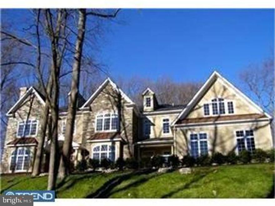 Magnificent European Manor Home "Quarry Hill"...  4/5 bedrooms, 4 1/2 baths, elaborate millwork, soaring ceilings, superior finishes of granite, marble & imported tile, chefs kitchen open to a 2   story family room with floor to ceiling stone fireplace, wall of windows, built-in media center, custom wet bar, paneled study, & French doors to a flagstone terrace with pergola.  The second floor offers master suite with sitting room, walk-in closets & luxurious master bath with amenities, enormous steam shower, 2 linen closets, whirlpool tub, 2 vanities & separate water closet. Oversized 4 car attached garage, custom built-ins throughout & magnificent lighted landscape design. Situated in the heart of Radnor Township. it is privately set atop a scenic glen & offering complete privacy. Buyer says bring all offers!!
