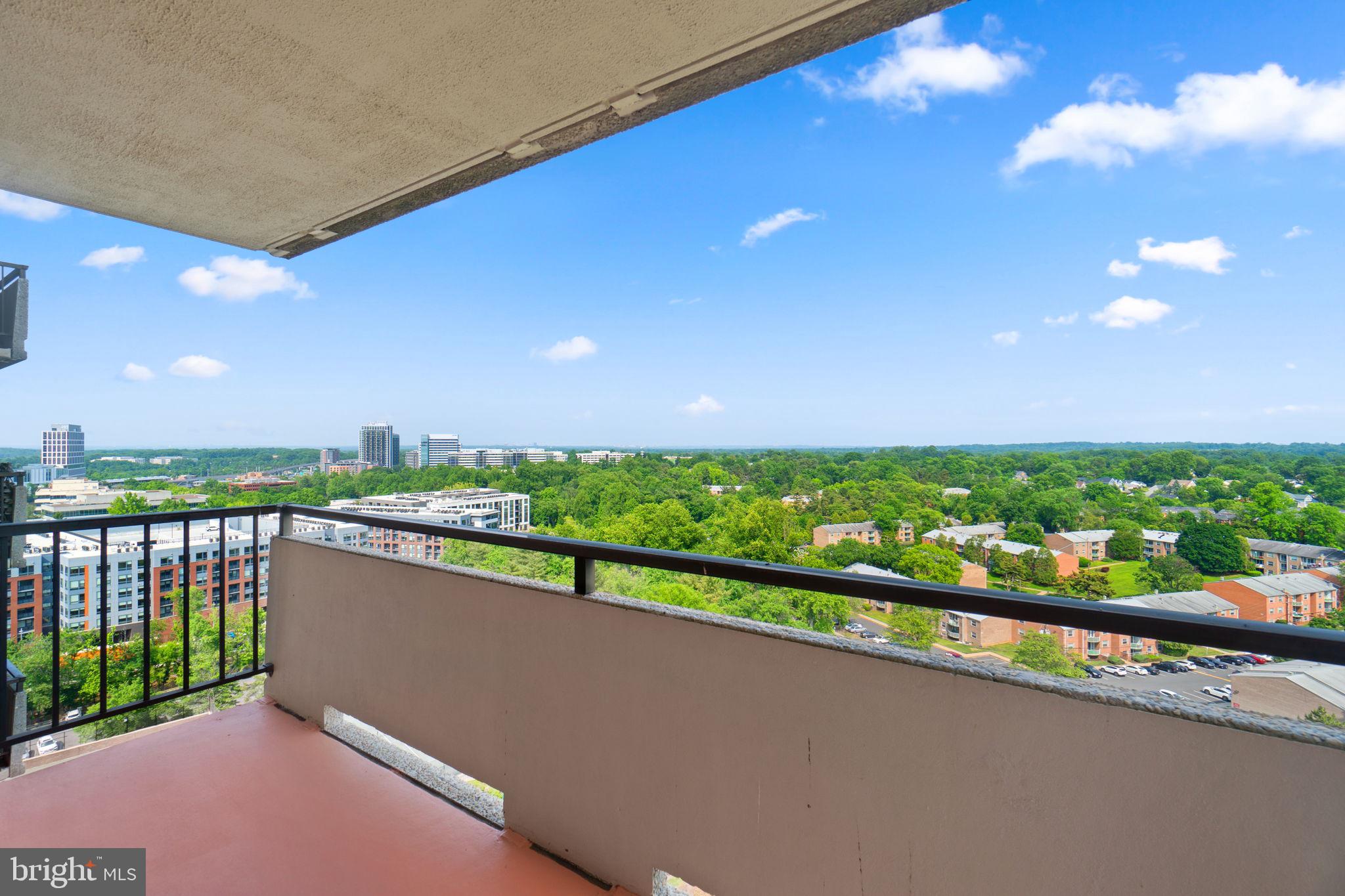 Welcome to this rare and stunning residence located at 1800 Old Meadow Dr., in the prestigious city of Mclean, Virginia. Situated in a prime location, this property offers both luxury and convenience, making it an ideal place to call home. This unique, mid-century modern condo is loaded with high-end elements from top to bottom. TWO condos have been combined --Unit 1512 and Unit 1513 -- and the result is fabulous! All Utilities are Included in Condo Fee!! Upon entering the residence, you are greeted by an inviting and spacious living area with marble flooring, neutral paint, and an abundance of natural light that creates a warm and welcoming atmosphere. The open floor plan offers a living room, dining area, kitchen, sunroom, and outdoor balconies providing the perfect setting for entertaining guests or enjoying quality time with your loved ones. The well-appointed kitchen boasts modern appliances, plenty of natural light from the large window, ample cabinet space, and granite countertops, making it a chef's delight. Whether you're preparing a casual breakfast or hosting a gourmet dinner, this kitchen is sure to exceed your expectations. The residence features 3 bedrooms which all have updated en-suite full bathrooms. The primary retreat offers tranquility and privacy with its generous size, hardwood flooring, two walk in closets with organizers and large windows! The attached en-suite bathroom is beautifully designed, featuring a luxurious dual granite vanity, walk-in shower with custom full body shower panel wrapped with luxury tile. Additionally, this property offers two other bedrooms that can be used as a guest room, home office, or a cozy space for relaxation. Every bedroom has its own ensuite full bath which have been updated with granite vanities and  modern fixtures.  Laundry Room offers a full size washer & dryer, utility sink, and 2nd refrigerator. TWO balconies have both been freshly painted and ready for you to enjoy the amazing views. The East facing balcony provides views of Washington DC, Mclean, Falls Church, and Chevy Chase! The other balcony faces South with views of Tysons and Mclean. Located in the heart of Mclean, this property is just moments away from a wealth of shopping, dining, and entertainment options. The nearby Tysons Corner Center and Tysons Galleria offer a premier shopping experience, while the surrounding area is dotted with upscale restaurants and cafes. Commuting is a breeze with easy access to 66, 495, 123, and Dulles Toll Rd. plus Silver Line Metro, providing a quick and convenient commute to Washington, D.C. and other nearby destinations. The Regency at McLean is an established condominium that offers its residents many amenities - all utilities are included (except internet/cable) as well as security, guard & gated entrance, 24 hour concierge, grounds & building maintenance, swimming pool, picnic area, convenience store, salon, on site management, library, common social areas and garage parking. Two garage parking spaces convey and Two Storage Units! ***All Condo Assessments have been PAID by the seller and ready for new owner!*** Unit #1512 (TaxMap 0294 08 1512) and Unit #1513 (TaxMap 0294 08 1513) are integrated seamlessly on the 15th floor with 2,431 sq. feet of living space!