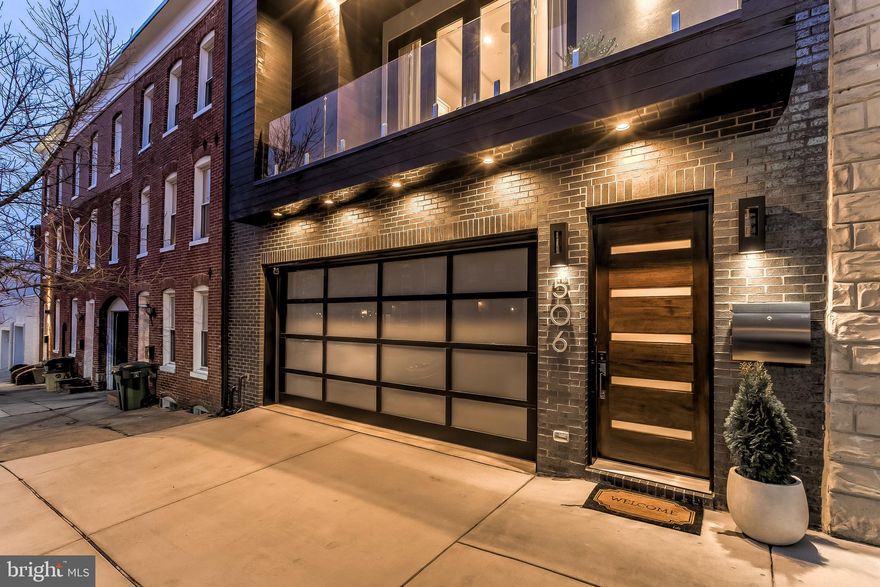 Exceptional and rare, 27 ft wide new construction townhome in Fells Point/Canton.  Approximately 4,000 sq ft featuring 4 bedrooms, 4.5 baths, office and 2-car garage.  Pull securely into your private garage and take the oversized elevator to the 3rd floor living area drenched in sunlight with breathtaking city views.  Gourmet kitchen features 9 ft waterfall quartzite island, GE Monogram appliances, high gloss white soft close cabinets and drawers, tons of storage space  & large pantry.   The large living room has an ethanol fireplace, modern  floating shelves, powder room and wet bar.  Stairs next to the wet bar lead to the 27 x 30 rooftop deck with amazing city & water views.  2nd level has 3 bedroom, 3 full baths and laundry room.  Incredible master suite features a 19.5' x 15.5' bedroom with hand woven grass cloth wall paper and large walk-in closet.  The attached master bath is fully tiled in calacatta marble with separate tub and shower, 6 foot double vanity and custom ceiling-height mirror.  Finished with only the highest quality systems, materials, fixtures and finishes including 8 foot solid core doors, glass railings, casement windows, 5-zone home audio system, living room home theatre w/surround sound, 6" sand in place hardwood floors.  Fully upgraded building materials including spray foam insulation, 2 separate high efficiency gas furnaces, 2 gas tankless  instant hot water heaters, sprinkler system, smart thermostats, heated floors & granite garage floor finishing.  Great central location- walking distance to Patterson Park, Fells Point & Canton.   All furniture conveys at full list price.  Agent is owner.