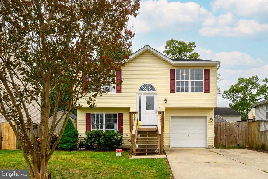A turnkey split foyer in Green Haven with 3 bedrooms, 2 full bathrooms, a brand new roof in 2026 and water access right down the street! The main/upper level offers an open family room with cathedral ceilings and a kitchen located just off the family room with white cabinets, stainless steel appliances, a pantry, and an attached dining room. The primary bedroom features cathedral ceilings, a walk-in closet and an updated ensuite full bathroom. Two additional bedrooms share a full hall bathroom, and new carpet runs through all three bedrooms as well as the hall and stairs.  The lower level is partially finished with a potential fourth bedroom (still needs paint and plaster), a mostly finished powder room (owner has vanity and toilet but needs to be installed) , garage access and a pellet stove. Walk out from the basement to the backyard where you will find the deck & a fully fenced yard with newly planted grass, firepit area and a playground.  The HVAC is three years old and the driveway has been widened with room for two to four cars and large enough to fit a boat. There is water access Just a short walk down Outing Road, at the Green Haven Wharf which gives you public access to Stoney Creek and has a new playground as well as a kayak launch and pier. This is a great location for commuters with quick access to MD-100, I-97, 295 and I-695, putting Baltimore, Annapolis, and Fort Meade all within practical daily reach and BWI airport is roughly 15 minutes away.
