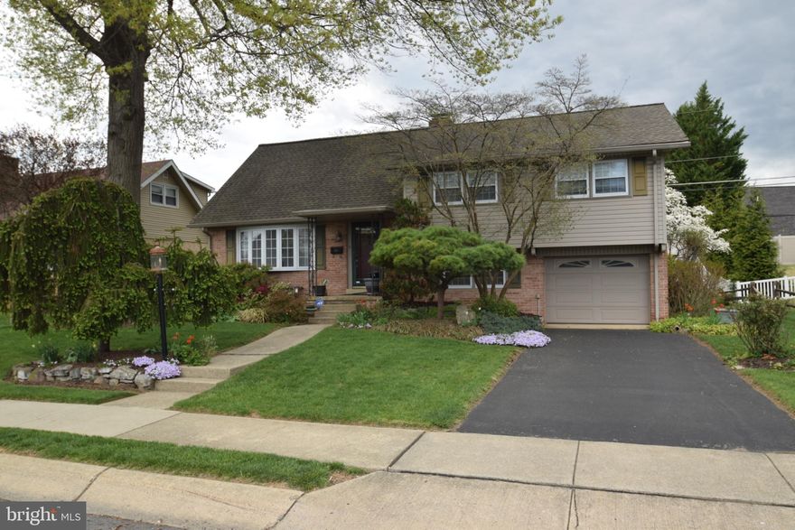 Welcome to your future home in desirable Spring Township, serviced by the highly rated Wilson School District. This inviting split-level residence welcomes you with established perennial gardens at the front of the home. Inside, it offers three spacious bedrooms and one and a half baths, and features wood floors in the living and dining rooms that enhance the warmth and elegance of the main living spaces. The chef in your family will love the Commercial-Grade Star stainless-steel natural-gas range, perfect for preparing memorable meals. Enter the home into the bright living room, then flow seamlessly into the kitchen featuring rich cherry cabinets, neutral granite countertops, a stylish tile floor, and a tumbled tile backsplash. The convenient breakfast bar is ideal for casual dining or entertaining guests in the adjacent dining room, which opens through glass doors to a covered porch overlooking a beautifully landscaped backyard—perfect for relaxing or hosting gatherings.

 

Upstairs, you'll find three generously sized bedrooms and a hall bath. The finished walk-up attic offers exciting potential for a home office, playroom, or future expansion. On the lower level, a spacious family room spans from the front to the rear of the home, complete with a gas fireplace, a half bath, direct access to the one-car garage, and a sunroom.  Stairs lead from this area to the basement, which accesses the laundry room, mechanicals, workshop, and storage area.

 

This home has undergone thoughtful updates over the years that have served the current owners' personal needs. It offers opportunities for your personal touches. The roof and water heater have been replaced in recent years. The property is being sold as-is, with the buyer responsible for municipal inspection costs and any required repairs. Enjoy added peace of mind with a transferable home warranty included at the time of sale. Property will be marketed for 5 calendar days once showings begin, before offers are reviewed. More photos coming soon—don’t miss the chance to make this exceptional property yours!