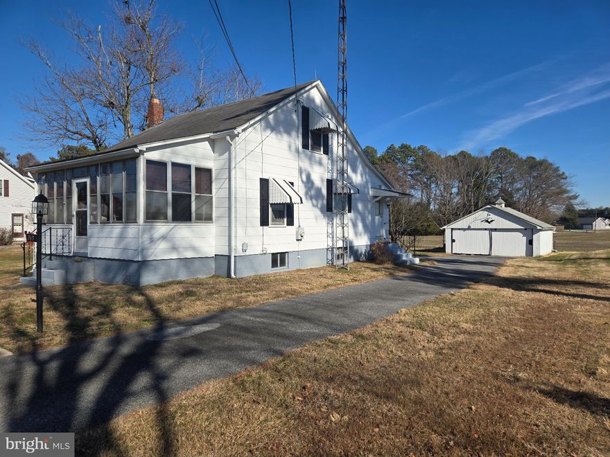 Sweet Bungalow, just outside City Limits,  electric service is Delmarva Power.  This is a 2 bedroom and 1 bath home that has been well cared for, as one person lived here and took very good care of everything.   The views out the Windows and very nice.   Character and a well cared for home that was stick built in the 1960s'. ...... this sounds like a winner to me.   The surrounding area is growing but, this particular property appears to have an advantage as across the street are plans of a park and behind the property is a farmed.      Seller would prefer to offer concessions for closing cost or a new roof, whichever is most important to a buyer.   Property should be able to go FHA or VA, as I believe the Floor Furnace is common to the area as I know the home next door had the same and the farmhouse across the street also a similar heating system.  (of course this would be at the discretion of the lender)