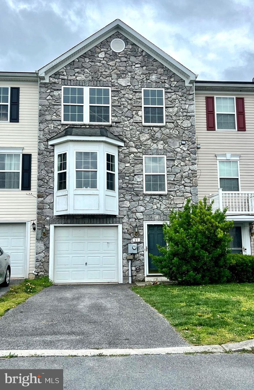 You will love this remodeled,  stone-front townhome with front entry garage and its own private driveway. Much of this home has been remodeled including NEW VINYL PLANK FLOORING throughout, professionally painted, NEW GRANITE counters and STAINLESS STEEL Appliances in kitchen, new LED lighting throughout, new commodes in all 3 bathrooms, and more!  The OWNER'S SUITE offers a large WALK-IN CLOSET and attached primary bathroom which includes both a shower stall and separate bathtub.  All three bedrooms on upper level have pitched ceilings maximizing the space.  The rear yard offers a privacy fence: perfect for pets. Don't wait: schedule your showing today.  All applicants must have a minimum of 640 credit score for consideration.