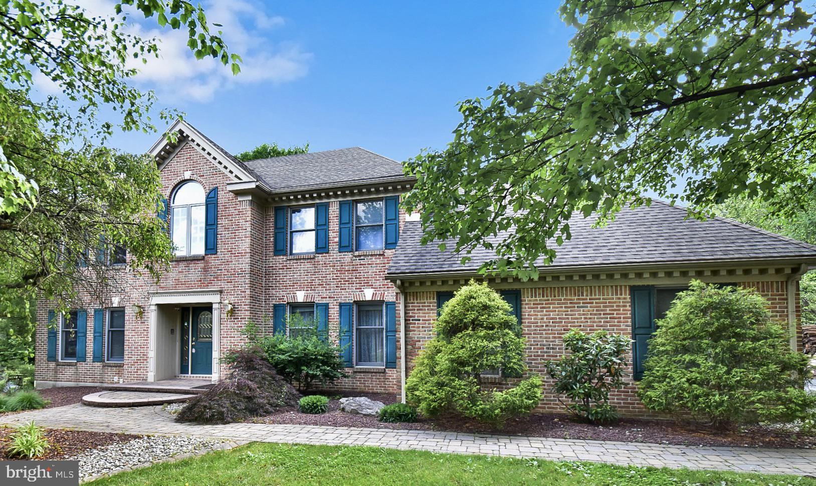 Refleshed & ready for its new owners w/NEW GLEAMING HW flrs & updates throughout this grand 4 BR 4 BA home. A stately, well landscaped brick colonial in the sought after Green Hills in Parkland SD. The grand central foyer w/curved HW staircase welcome you. New HW flr in DR, LR & sun filled FR w/vaulted ceiling, brick FP & dbl drs leading to expansive deck & patio overlooking the lush, perfect back yard to relax and entertain. Newly finished HW flrs in spacious eat-in kitchen w/pantry, lots of counter space & 2nd sink, & sliding doors to deck. Lg laundry/mud rm & side door to back yard. Second flr boasts elegant dbl drs to the incredible MB ste w/vaulted ceiling, 2 WI closets & dressing area, 3 more spacious BRs w/lg closets, & a versatile loft area. The finished bmt w/office, full bath, & storage, offers abundant space for all to enjoy. Perfectly located across fm park w/walking path, playground, tennis & Bball courts, & only a few blocks fm community pool.  And just off Rts 22, 78, 100 & Turnpike makes for an ideal commute!