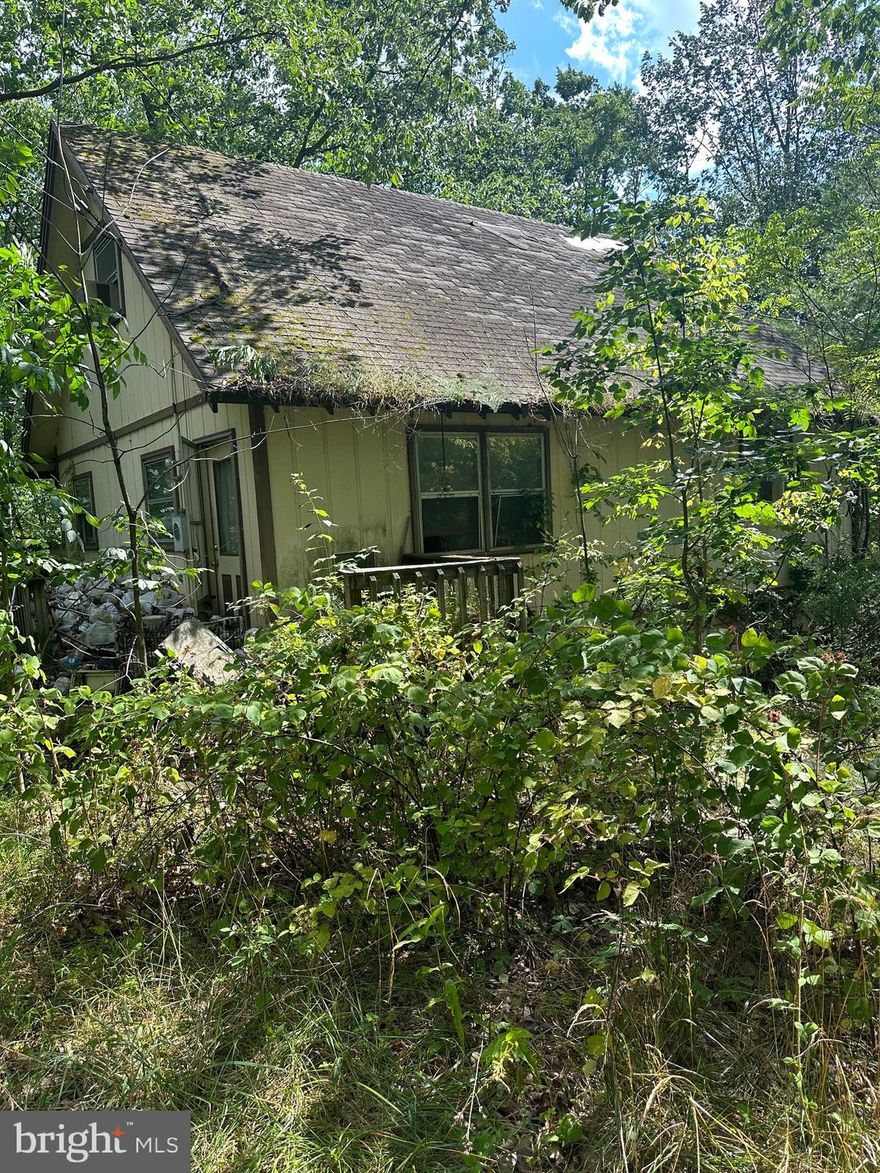 Check out this improved 1.5 acre close to the Berkeley  County line. Lot has well, septic and electric on site. Property is located at the end of the road for some privacy. Home on property has no value and is believed to be uninhabitable by the seller so it is is being sold as-is.