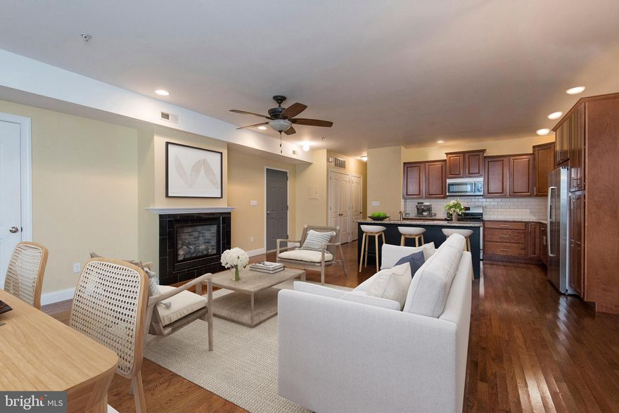 Available for early June move-in.  Welcome to a fabulous boutique rental in Manayunk with one car garage parking, located just steps away from the heart of Main Street. This third floor unit invites you with a wall of windows in the front of the house and functional gas fireplace in the center. The living room opens to a chef's eat-in kitchen with island, stainless steel appliances, and plenty of cabinet and counter space. The primary bedroom hosts dual closets and en-suite bathroom with walk in shower with dual vanities. This unit offers an additional bedroom and guest bathroom, with convenient washer and dryer in the hall. Extra storage is provided in the garage for easy access.