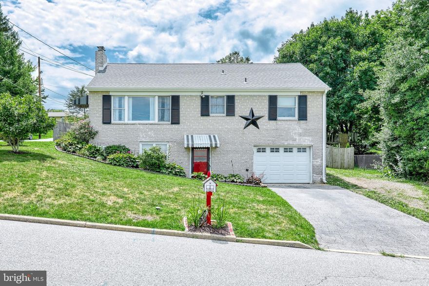 This is a quiet corner lot offering a single-family brick cape cod with 4 bedrooms and 2 1/2 baths in the Southern York County School District overlooking Glen Rock.  Two bedrooms on the main level with two additional bedrooms upstairs with a half bath.  Nice sized main bathroom with tile floor and tile tub/shower surround and a bonus full bath in the basement.  The eat-in kitchen opens to the living room with a large window to let the sunshine in!  The fenced backyard provides entertaining space complete with a firepit or space to play.  You can also relax on these warm summer days with your iced tea on the covered porch in the shade.  Are you looking forward to fall?  Cozy up around the wood-burning fireplace in the downstairs family room.  Recent improvements include a new roof with architectural shingles, gutters, and downspouts in 2018, new soffit and facia in 2020, and waterproofing in the basement and garage.  This home is walking distance to the Rail Trail, library, and downtown amenities.  This property is ready for you to add your own special touches!  For Showings: Please wear masks and no more than 3 people in the home at a time.  Use hand sanitizer prior to entering.  No parking is allowed on the same side of the street as the house.  Use the driveway or park across the street.