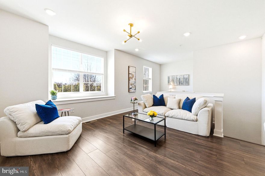 Welcome to 142-A Annapolis Street, a beautiful home in the sought-after Waterside community of Bensalem. From the moment you enter, you’re greeted by a versatile Great Room, perfect as a home office, gym, or additional living space, offering flexibility to suit your lifestyle. As you continue down the hall, you’ll find a convenient powder room, laundry area, storage closet, and access to the one-car garage, complete with a Tesla charger. Upstairs, the home opens into a bright and airy open-concept layout, seamlessly connecting the kitchen, dining, and great room, ideal for both everyday living and entertaining. The kitchen features stylish shaker-style cabinetry, granite countertops, and stainless steel appliances. The adjoining dining and living areas provide ample space for gatherings, while a cozy nook just off the family room offers the perfect spot for a home office, complete with an additional storage closet. The private primary suite offers a generous closet and an en-suite bath with granite countertops and a floor-to-ceiling tiled shower. A second bedroom has access to a full hall bathroom, providing comfort and convenience for guests or family members. Additional highlights include 9-foot ceilings and low-maintenance floating plank flooring throughout the main living areas. Located just steps from the Delaware River, this home offers easy access to I-95, Philadelphia, and New Jersey, making commuting a breeze. Don’t miss your opportunity to own in this vibrant, waterfront community!