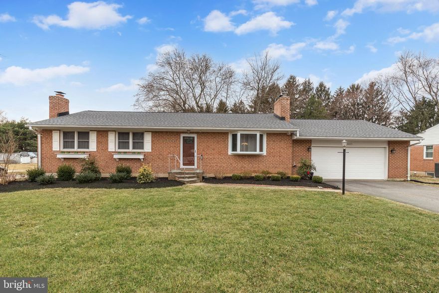 Beautiful  Rancher, located in Ellicott City’s sought after Wilton Acres community, boasts 2 finished levels, a fenced level backyard, and updates that include a new roof, appliances, fresh paint, door, professional landscaping, and more.  Hardwood flooring and a fresh neutral color palette are highlighted in this lovely home that begins with the sun filled living room offering a bay window, and a wood burning fireplace set in a rustic stone surround,  and opens to the dining room with access to the garage.  The eat-in  kitchen features stainless appliances, including a new electric stove, and wood cabinets.  Hardwoods continue throughout all 3 main level bedrooms, and the primary bedroom has an attached full bathroom and ceiling fan, with 2 sizable bedrooms, and a full bath completing the main level sleeping quarters.  The lower level provides a spacious family room showcasing  brick and wood accent walls with a wood burning stove and  new carpet, a large bedroom, a full bath, plus ample storage space with walkout stairs to the backyard.  Enjoy outdoor living in the fenced and level backyard on the expansive deck admiring the professionally landscaped grounds, and being just minutes from Columbia, Marriottsville, and Woodstock, for a vast variety of shopping, dining, and entertainment options. Nearby Alpha Ridge Community Park and Patapsco State Park for outdoor recreation. Convenient commuter routes include Route 40, MD-29, MD-99, and I-70.  This fantastic home won't last! Offers Due Monday March 7th, by Noon.