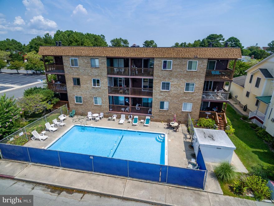 Unobstructed canal view overlooking the outdoor pool! This adorable 2BR 1BA Condo has been totally updated Features include granite counters, stainless appliances, ceramic tile and laminate flooring, ceiling fans, wood burning fireplace, updated bath, laundry room with full size washer and dryer and deck with great views overlooking the out door pool. Sold furnished this is a great unit at a great price!