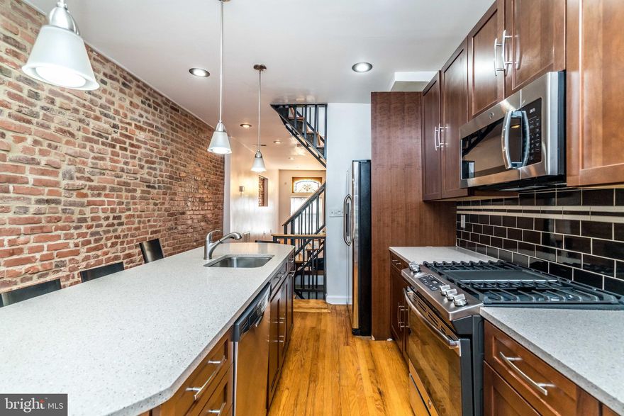 Perfectly situated 3 bedroom 3 bathroom rowhome in the heart of Canton available for rent beginning 8/1/2020! This home is ideal for roommates as each person has their OWN bathroom! Home includes open floor plan, exposed brick, beautiful staircase, kitchen with center island featuring plenty of cabinet and countertop space, tons of natural light, rear deck off of kitchen and more! Tankless water heater makes for low utility bills. Schedule your private showing today. *$40 application fee per person. Approved applicant would be responsible for a one time $60 flat fee.