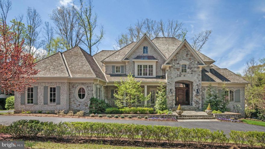 This custom stone & brick home built in 2002, is exceptionally located on a private cul-de-sac off of Burdette RD.  Interior finishes are unsurpassed in design & quality.  Formal rooms flow seamlessly from entry hall.  All the right rooms for grand entertaining & family living. Total of 6 bedrooms, 5 full & 3 half baths in a picturesque setting.