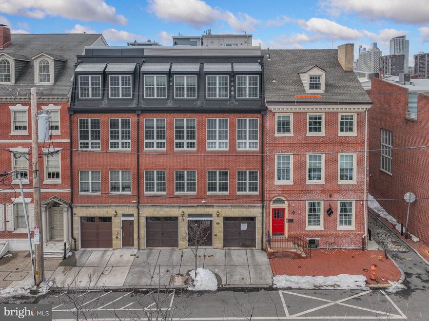 Welcome to 512 S Front St #2, a truly exceptional 3 bedroom, 3.5 bath condo offering over 3,200 square feet of beautifully designed living space in the heart of Society Hill and the Headhouse District. Built in 2013, this multi-level residence blends modern luxury with an unbeatable historic Philadelphia location.
The main level features a bright, open floor plan with hardwood floors, soaring ceilings, and expansive sliding glass doors that lead to your own private outdoor area, perfect for morning coffee or entertaining. The chef’s kitchen is outfitted with granite countertops, rich wood cabinetry, a center island with seating, gas cooktop, double ovens, stainless steel appliances, wine fridge, and convection microwave.
Upstairs, you’ll find two spacious bedroom suites, including a stunning primary retreat with walk-in closets, double vanities, and a glass-enclosed shower. The fully finished lower level adds incredible flexibility, featuring a cozy family room with a gas fireplace, plus a private suite with a full bath and direct outdoor access, ideal for guests, an au pair setup, or a home office.
Additional highlights include deeded parking, very low condo fees, recessed LED lighting, two-zone HVAC, Nest thermostats, and 200-amp electrical service.
Best of all, this home places you steps from Philadelphia’s best dining, boutiques, and waterfront parks, plus you’ll be near one of the city’s most exciting future transformations: the new park project being built over I-95, which will reconnect Old City and Society Hill to the Delaware River with vibrant green space, walking paths, and community areas. It’s a rare opportunity to own in a location poised to become even more extraordinary.
Walkable, luxurious, and perfectly positioned, 512 S Front St #2 is city living at its finest.