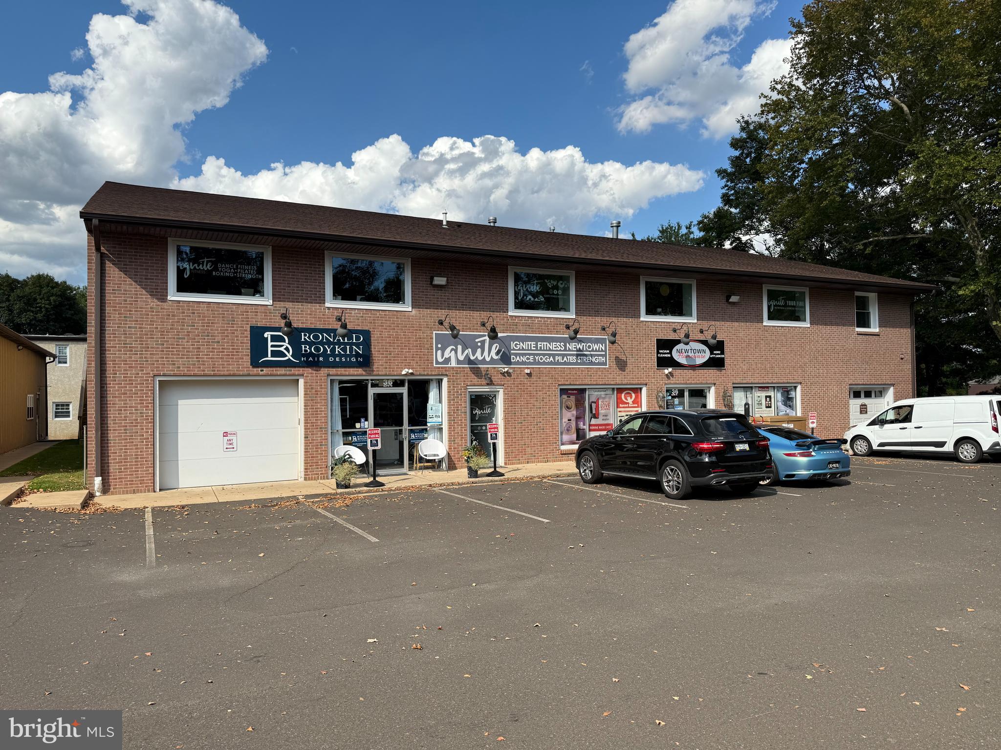 Walk-up second floor space with ample reception area, bathrooms, two private offices, and 2 large open studio spaces. Previously a spin and fitness studio; High ceilings; $21/sf = $7000/mo - includes water and sewer; just plus electric and cable