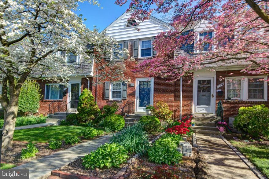 Seller to review contracts on 5/4 at noon.  Sparkling well maintained brick townhome with  deck & large manicured, newly fenced backyard. Hardwood floors...Open updated Kitchen w/ bar  to dining room. Large  Master Bedroom w/ good size closet  Nice size second bedroom  . Finished family room with recessed lighting.. Laundry room... Walk 5 blocks to Metro (6/10th mile)