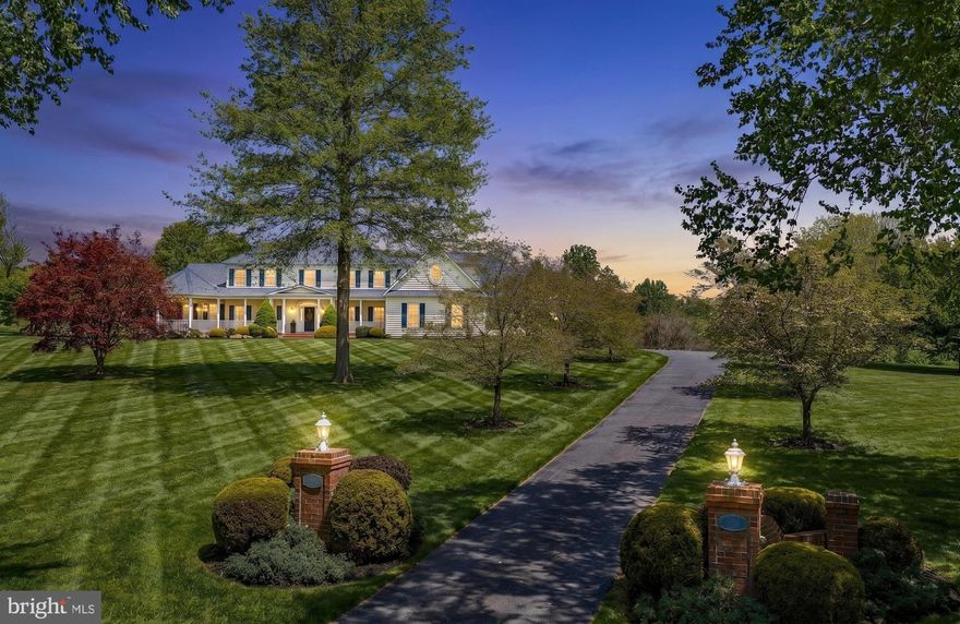 Gorgeous Custom Colonial with Southern-inspired architecture, ​perched on a breathtaking 5.12-acre estate, boasting panoramic views from every angle. Step onto the ​welcoming front porch or retreat to the back porch, where a meandering hardscape leads to a relaxing hot tub and gazebo, inviting you to unwind​. Step inside and embrace the thoughtfully designed floor plan, beginning with a two-story foyer that flows into the formal living room, dining room, powder room, and family room featuring cathedral ceilings, an oversized mantle with the warmth and ambience of a gas fireplace.  The beautifully ​u​pdated gourmet kitchen ​i​s highlighted by luxurious quartzite countertops, ceramic tile backsplash, updated lighting and new stainless steel appliances, offering a blend of elegance and everyday functionality. Conveniently located off the family and dining rooms, the kitchen opens to a sun-drenched sunroom with sweeping views of the surrounding landscape​, as well as the mudroom, providing access  to the​ laundry room, oversized 3 car garage and upper-level bonus room over the garage. Retreat to the main-level owner’s en-suite, complete with a private sitting room featuring French doors leading to the front porch, a spacious walk-in closet, and an updated owner’s bath with ​e​egress to your backyard oasis. Upstairs, a second owner’s en-suite awaits​ with a dressing area, walk-in closet, and additional storage. A balcony overlooking the family room leads to two additional bedrooms, a full bathroom, and the bonus room. The expansive lower level presents an opportunity for multi-generational living or a private in-law ​suite with an amazing great room that serves as a central gathering space and flows into a future kitchen area, complete with rough-in plumbing and electrical. A​n exercise room can be reimagined as a bedroom and connects to a den, along with access to two large storage areas and walk-up stairs to the outdoors. A recreation room enhances the level’s flexibility, offering the potential for an additional bedroom, media space, or private living area. With a full bathroom and laundry already in place, this level provides both independence and ease​. ​​Don't hesitate, Make your dream a reality today!