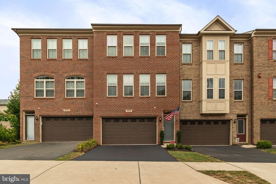 Step inside to discover hardwood flooring on the main level that seamlessly blends style with durability. The gourmet kitchen is a chef’s dream, featuring granite countertops, a full-length tile backsplash, a cooktop and double ovens, French door refrigerator with bottom freezer. You'll also love the spacious walk-in pantry.
The bright and open main level is ideal for entertaining, with access to a composite deck (20x12) overlooking the stamped concrete patio below. Upstairs, the owner’s suite impresses with a tray ceiling, walk-in closet, and a custom grout-less stone shower with rain head and wand.
The finished walk-out basement includes a large rec room, LVP flooring, and a half bath 
This home blends luxury, comfort, and function in a prime location close to commuter routes, shopping, dining, and top-rated schools. Don’t miss the opportunity to own this truly move-in ready gem!
