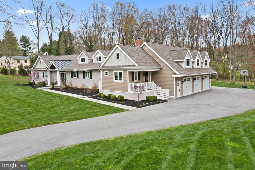 Looking for a totally renovated home in desirable Radnor Hunt in Willistown located on a flat 2.5 acre lot?   Well, here it is! This fantastic 5-6 bedroom, 4 full Bath, 2 half bath Cape Cod home is truly magnificent! It was completely renovated in 2016 down to the studs.  Enter into a dramatic two story entry foyer with wainscoting  and beautiful hardwood floors which leads to an open and inviting living room with hardwood floors, recessed lighting & glass doors leading you to the family room, complete with hardwood floors, a tray ceiling & French doors to the flagstone patio.  The gourmet eat-in kitchen with a large granite island offers space for up to 6 stools.  Other features of this glorious and open kitchen include a glass subway tile backsplash, extra large & extra deep stainless steel sink, an upgraded Viking dual source oven and range, 2 appliance garages, recessed lighting & a stainless steel Kitchen Aid refrigerator.  The kitchen opens up to the inviting family room with hardwood floors, a wood-burning fireplace with granite base & full brick wall and recessed lighting.  There is a second set of  French doors opening to the large expansive flagstone patio which is partially covered and overlooks the bucolic flat back yard.  The patio features a partial bathroom with a tile floor & closet designed for convenience while outdoor entertaining.  The generous yard affords lots of room for the kids and pets to play and even space for a pool!  Back inside, the first floor also offers a luxurious retreat in the master bedroom suite.  Amenities include a dressing area with 2 walk-in closets that feature custom Closets-by-Design built-ins with shelving & pocket doors and a separate closet with cabinets & drawers.  The sumptuous Master Bath with gorgeous high-end Carrara marble floors has an oversized tub, recessed lighting, double sinks, a separate shower with a beautiful marble floor, a seat & marble surround and a linen closet.  Finishing off this incredible 1st floor is a laundry room with a tile floor & granite countertops, a private office, also with hardwood floors, a mudroom with brick floor, 5 custom built-in cubbies, custom wainscoting, a closet, seating, a rear staircase which accesses the second floor & a side entry door with a covered porch.  The oversized 3 car garage, lower level and powder room are all accessed from this spacious mudroom as well.  The 2nd floor is just as fabulous as the first, with a workout room-with an attached bedroom, 4 additional bedrooms, two with Jack & Jill baths, one with an En-Suite Bath, & closets galore!  All recessed lighting is energy efficient LED.  The basement is full & unfinished, very easily could be finished for additional living space.  The home also has a whole house GENERATOR. This special home cannot be duplicated! It shows like a Model Home and is the perfect family dream home in an awesome location! A must see!!!