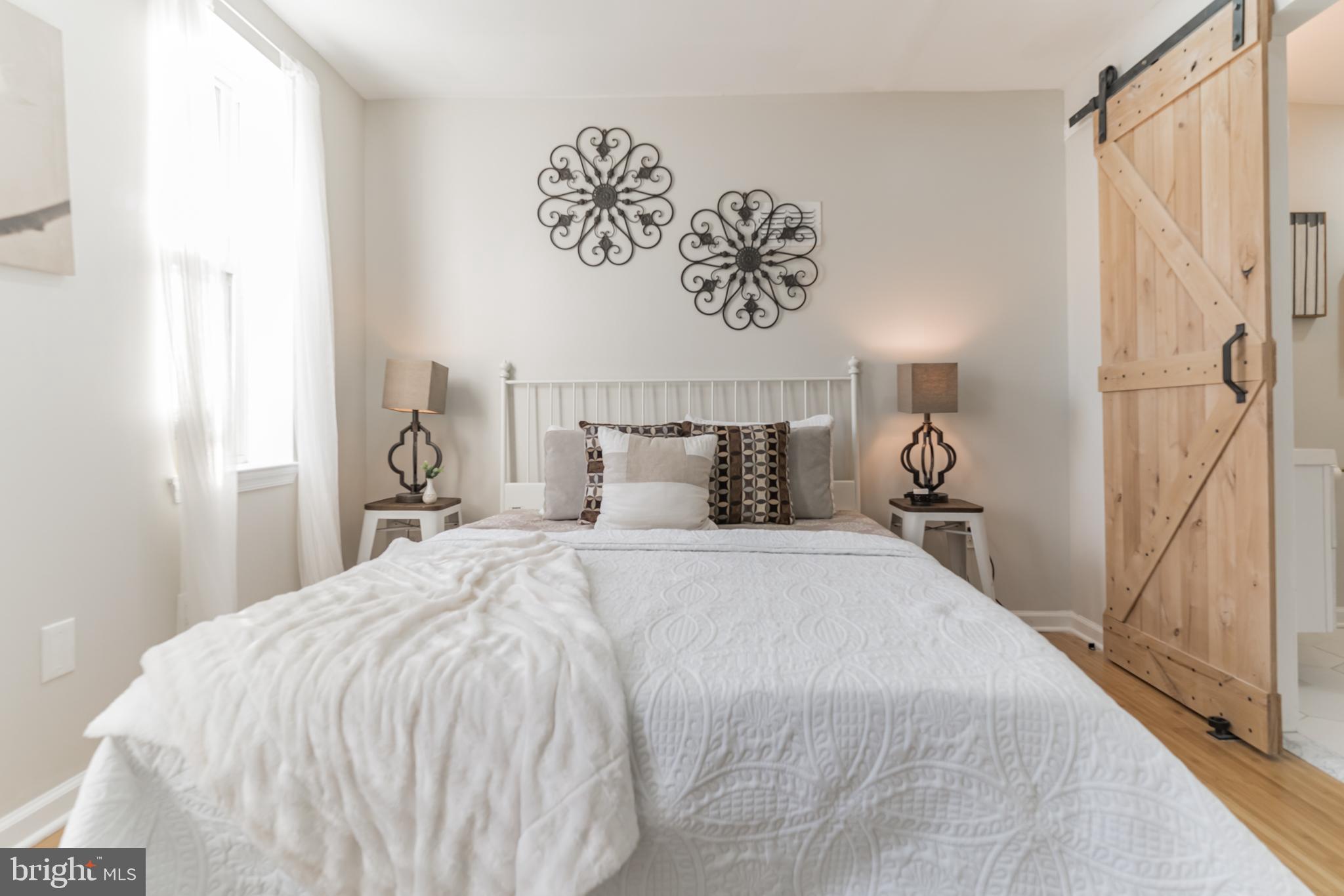 Come tour this recently renovated townhome and fall in love with it's modern charm. This amazing home is awaiting new owners. This beauty is back on the market with a price improvement!
This fresh and classic design offers an inviting open floor plan with half bath while maintaining the warm feel of home. This beautiful 2 bed/ 2.5 bath boasts wood floors, stainless steel appliances, custom cabinetry and a lot of personality. Upstairs, you'll find a half bath, two nice sized bedrooms including an owner's suite which features a full bath and a barn door that captures the beauty of the second floor.
The finished basement offers great storage space with a separate utility area, living space perfect for a home gym or entertainment and an enclosed laundry area.
This is a Prime location! A few blocks from the historical Girard College, walkable to Brewerytown restaurants, coffee shops, public transportation, and more. Just a quick walk to the Art Museum, Schuylkill River Trail, and Fairmount Ave. Staging furniture was removed from property.
Schedule an exclusive appointment today. If you're looking for a house to call home...look no further. Welcome home!
Qualified buyers may be eligible for the 10,000 Philly First Grant . *** One year home warranty also included with full price offer. ***PLEASE NOTE: STAGING FURNITURE HAS BEEN REMOVED****
