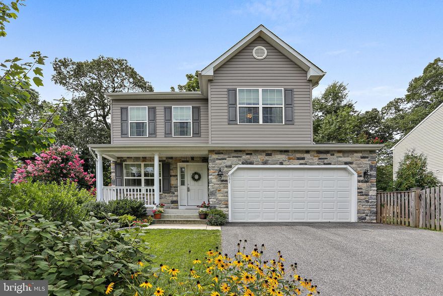 This Stunning 4 bedroom and 2.5 bath Colonial has a two car garage and is in the heart of Severna Park in the sought after Community of Whitney's Landing.  At only 6 years old, this is the opportunity you have been waiting for! Enter from the covered front porch into the living room with tons of natural light. Hardwood floors on the main level lead to the dining room and kitchen with a large sliding door that opens to the back composite deck. The kitchen has a large center island, granite counters, stainless appliances and subway tile backsplash. Rounding out the main level is a half bath and laundry. Upstairs you will find a large primary bedroom with an ensuite that includes dual vanity, soaking tub, separate shower, and walk in closet. Also on the second level, there are 3 generously sized bedrooms and second full bathroom with tub/shower combo. The basement has been recently finished with a luxury vinyl plank flooring and has a large storage area that includes a bath rough in, wash basin, and upgraded electrical to allow for a house generator. With the addition of the composite deck and fence, the immaculately cared for backyard has plenty of space for outdoor activities.  Whitney's Landing Community Association includes water privileges with an annual fee of $125 which offers a sandy beach, a community beach house, boat ramp, kayak/canoe rack, ample parking, firepit, and a volleyball court . Boat slips available for rent. This home Must be Seen!