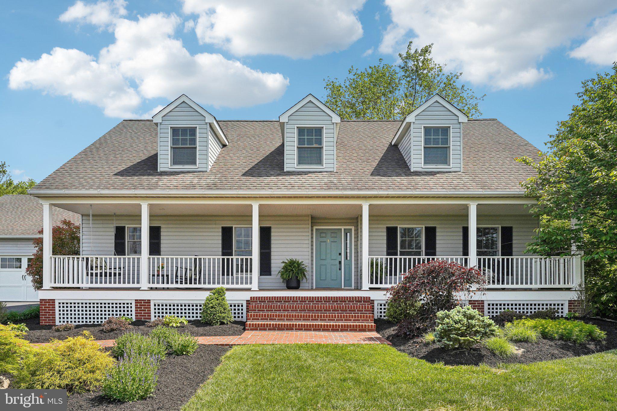 Don’t miss this rare opportunity to own a fully updated custom home in a prime Green Lane location! Situated on a beautiful .67-acre lot, 8503 Memorial Drive offers the perfect mix of modern updates, country charm, and everyday functionality. This wonderful home has been exceptionally maintained with new HVAC and replacement Anderson windows. No expense has been spared updating this home which will be evident when you see it for yourself!
A timeless front porch welcomes you into a warm and inviting interior, where rich oak hardwood floors flow throughout the main level. To the right, a stylish living room centers around a striking electric fireplace with a glass tile surround. The updated kitchen features wood cabinetry, granite countertops, a tasteful tile backsplash, and just replaced top-of-the-line stainless steel KitchenAid appliances. The family room offers generous space for everyday living, complemented by recessed lighting and an adjacent dining area ideal for casual meals or entertaining guests. A versatile first-floor bedroom, currently used as a home office, is paired with a modern full bath boasting a glass-enclosed shower.
Upstairs, the primary suite is a sanctuary of luxury. One of the home’s true highlights, the en-suite bath is exquisitely designed and straight out of a magazine or better yet instagram worthy! This space features a custom double vanity with ample storage, built-in soaking tub, and a spacious walk-in shower adorned with elegant tile and champagne bronze fixtures. The thoughtfully designed walk-in closet is simply a dream. Two additional bedrooms, an updated hall bath, and a cozy open sitting area round out the second floor, offering ample space for family or guests.
Outside, the living space extends to a stunning two-tier paver patio, perfect for dining, lounging around the fire pit, or enjoying beautifully landscaped surroundings. A new shed and enclosed garden can be found at the rear of the yard. Practical upgrades elevate this home even further: energy-efficient Andersen windows, a new HVAC system (2024), a newer hot water heater (2020), and Lutron smart lighting for both convenience and ambiance. The oversized two-car garage provides generous room for storage and workshop space, while the full-height unfinished basement offers the potential to expand your living area. Ideally located just steps from Marlborough Elementary and the Perkiomen Trail, this home offers the rare combination of privacy and convenience. This home must be seen to be appreciated. 8503 Memorial is ready to welcome you home.