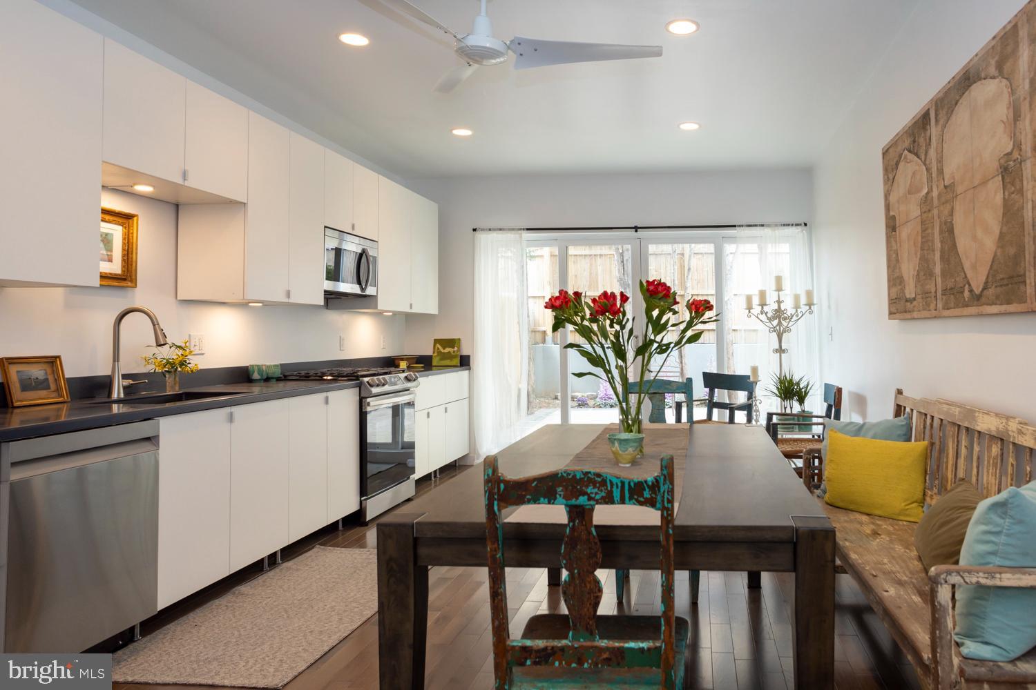 This fully renovated townhome is on the edge of Old Kensington and Fishtown. It was an expanded trinity that was further renovated over the last year into a three-story home with 1,800 square feet. It has four bedrooms and two full baths. The first floor has an open floor plan that would be wonderful for entertaining from the front door, through the living room and kitchen to the sliding glass doors that lead to a large tree-lined patio. The kitchen has upgraded stainless steel appliances and custom cabinets. The kitchen is large enough to accommodate a large dining table and a cozy area for office space or a reading nook. The patio landscaping and evergreens provide a year-round oasis and view from all the floors. The second floor has two spacious bedrooms, a full bathroom and a full-sized washer and dryer. The third floor has two bedrooms and a full bath, which could also be used as a master bedroom floor. The smaller bedroom could be a walk-in closet, dressing room or office. The house has all new windows, recessed lighting, ceiling fans, hardwood flooring and a beautiful staircase and railing between the floors. There is a basement for extra storage and the patio has a shared easement to the street. This is a wonderful neighborhood that has many attractions including the Crane Arts building and The Clay Studio a block away, and just 2-3 blocks from the restaurants, shops, and nightlife of Fishtown. The nearby restaurants include Wm. Mulhern & Sons, Pizzeria Beddia, Suraya and Front Street Café. Hancock Park has a playground and dog run a block away. There are many grocery, gym, and day care options nearby. The many public transportation options include Septa rail with an entrance four blocks away. Although there is ample parking on the street and in the neighborhood, there are also private lots where you can rent a monthly spot. There are also four nearby microbreweries.