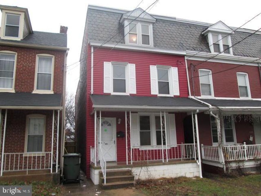 3 story semi detached home on a wide, quiet street. Features a front porch, easy maintenance brick exterior and off street parking. Interior sparkles with fresh paint, new tile countertops, appliances, lighting and more. 4th bedroom in the attic with possible 5th bedroom as pass thru.