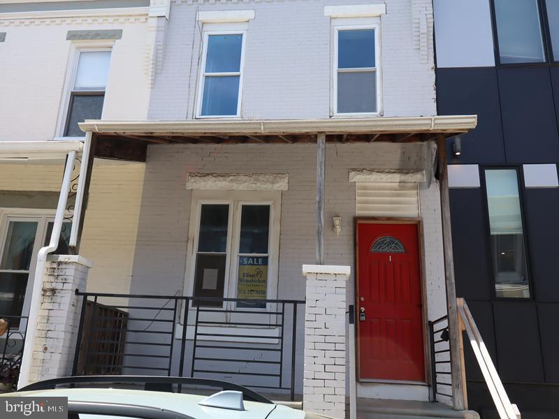 Grand opportunity for this 2-story brick row home built in 1925. Subject is located is Brewerytown section of Philadelphia (North Philadelphia) and features rear yard, open front porch. Walk into spacious open floor plane living room, the flows into kitchen area. Second floor shows 3 bedrooms and hall bath. Access the mall rear second floor deck via from bedroom 3 via sliders. Finished basement with powder room area, plenty of on street parking, conveniently close to shopping, and public transit and mins away from major roadways.