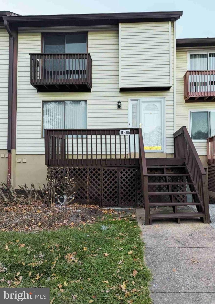 This property requires Cash and VA only Buyer.  Newly refreshed with upper level washer and dryer,  a new kitchen cooktop stove, new ceiling fan with a remote in the dining area, refreshed kitchen cabinets, marble top vanity and more.  This refreshed unit two level condominium features three bedrooms, one full bathroom, one half bathroom (powder room), new carpet on upper level,  bedroom level washer and dryer, a front porch,  a rear deck, parking and a home warranty.