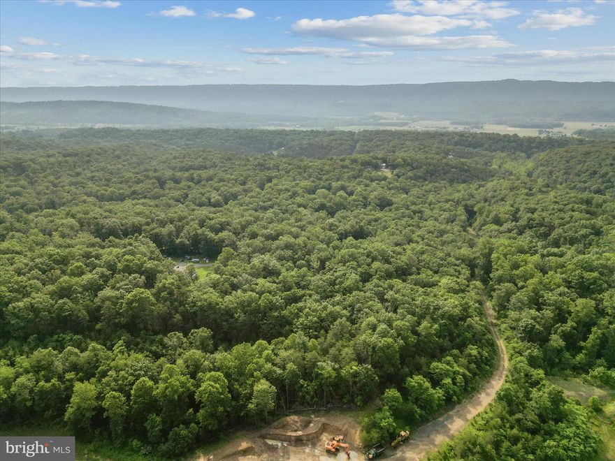 Beautiful 6 acre lot right off a paved road. Build your mountain getaway or full-time residence. No HOA.  Deeded shared driveway (#563) to access the land. Current owner has no actual knowledge of the property. Buyer to do their due diligence.