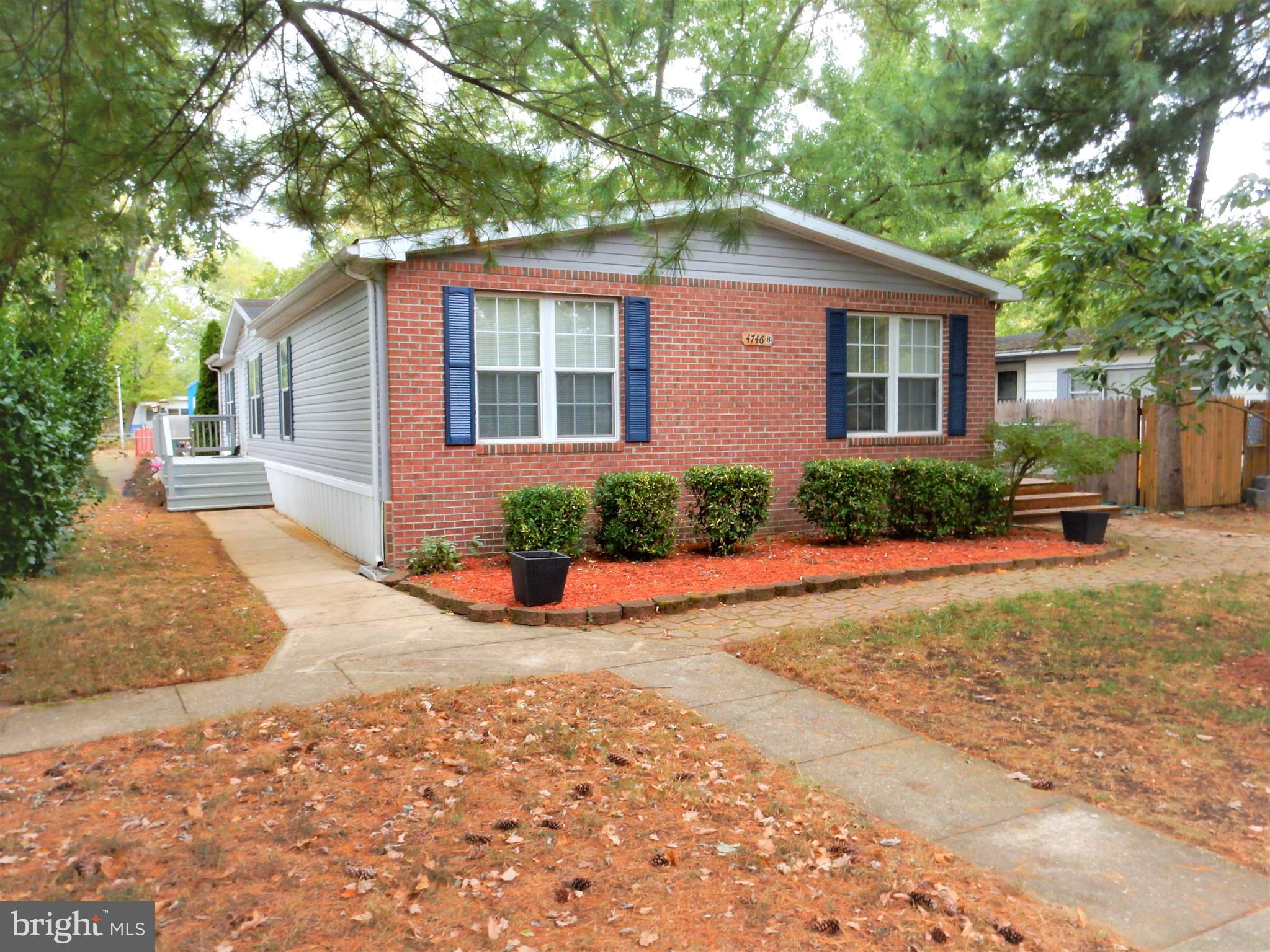 BIG & BEAUTIFUL! Spacious 4 BR Doublewide on Great Cul de Sac Lot in Sought After MD Manor Mobile Home Park. Updates Include New HVAC, New Master Bathroom, Ceramic Tile in Hall Bath, Carpet & Paint. Huge Country Kitchen w/Island Breakfast Bar. Separate Living Room, Family Room & Dining Room. Master Bedroom with Full Bathroom, Custom Ceramic Tile, New Shower Stall and Walkin Closet. Nice Sized 2nd, 3rd & 4th BR's. Nicely Landscaped Lot with Front and Rear Sundecks, Paver Patio & Shed. WELCOME HOME!