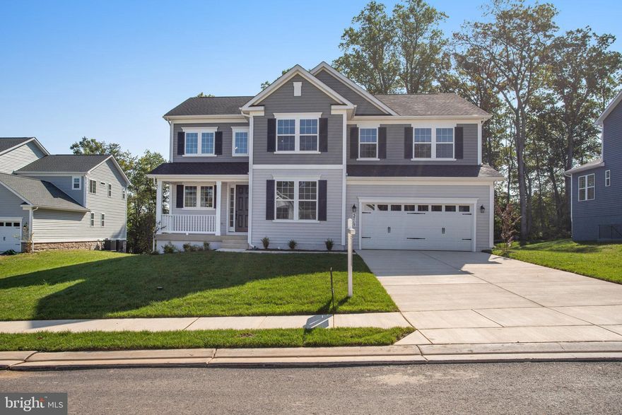 This Presley by Richmond American is MOVE IN READY!!   Welcome to this inviting Presley home. Included features: a covered porch; a dramatic two-story entry; a study; a great room with added windows and an electric fireplace in the great room; an impressive kitchen with amazing quartz island, a gourmet kitchen, a walk-in pantry and a main-floor powder room; an upstairs laundry with sink; a lavish primary suite with additional windows, oversized walk-in closet, a deluxe bath with a walk-in shower, and finished basement with a rec room and bathroom. This home also offers open oak stairs, luxury vinyl plank floors, and quartz countertops throughout. This could be your dream home! This community is only minutes from the Avenue & Mall at White Marsh for dining & shopping.